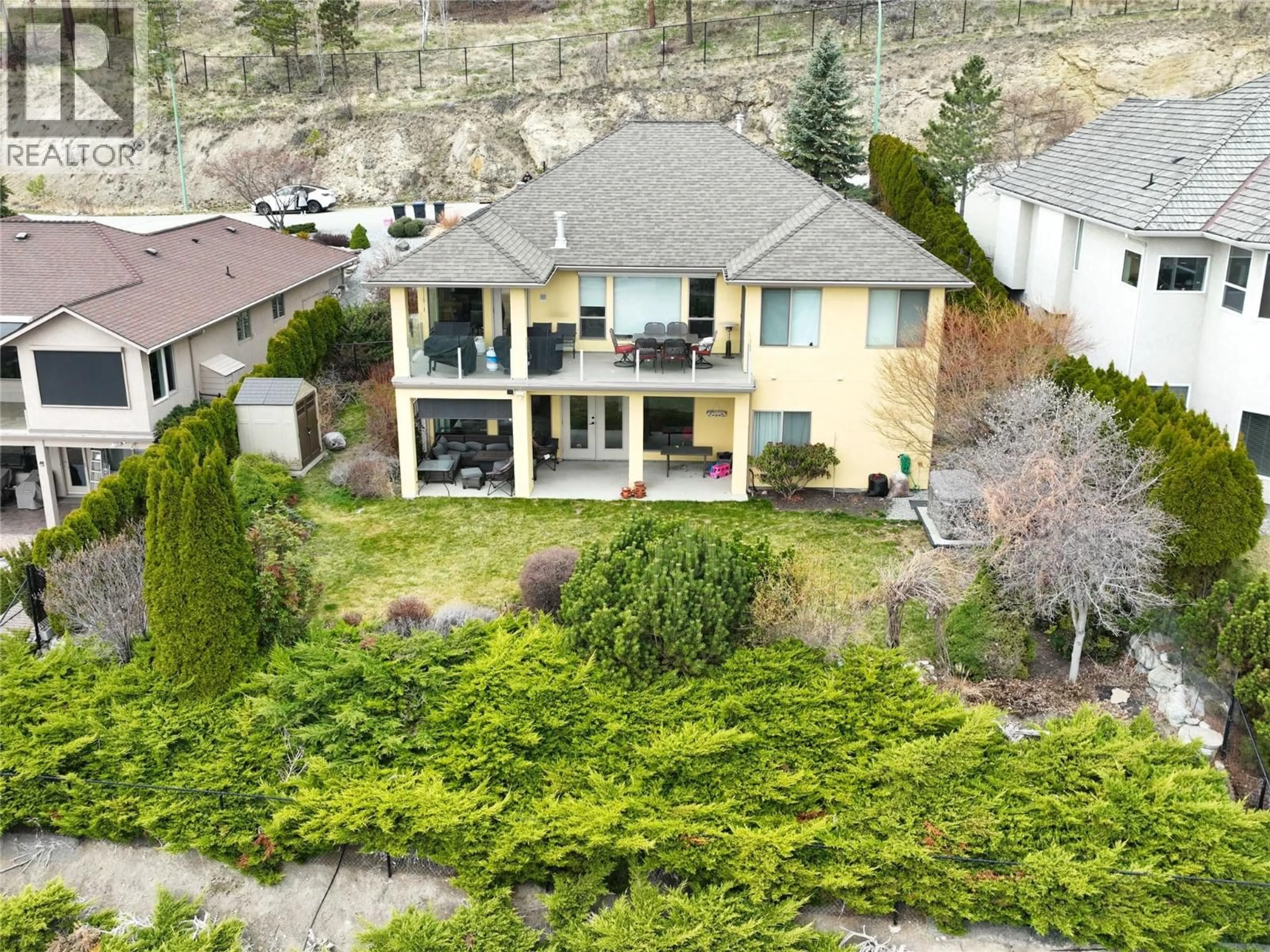 A pic from outside/outdoor area/front of a property/back of a property/a pic from drone, mountain view for 3617 GALA VIEW DRIVE, West Kelowna British Columbia V4T2M3