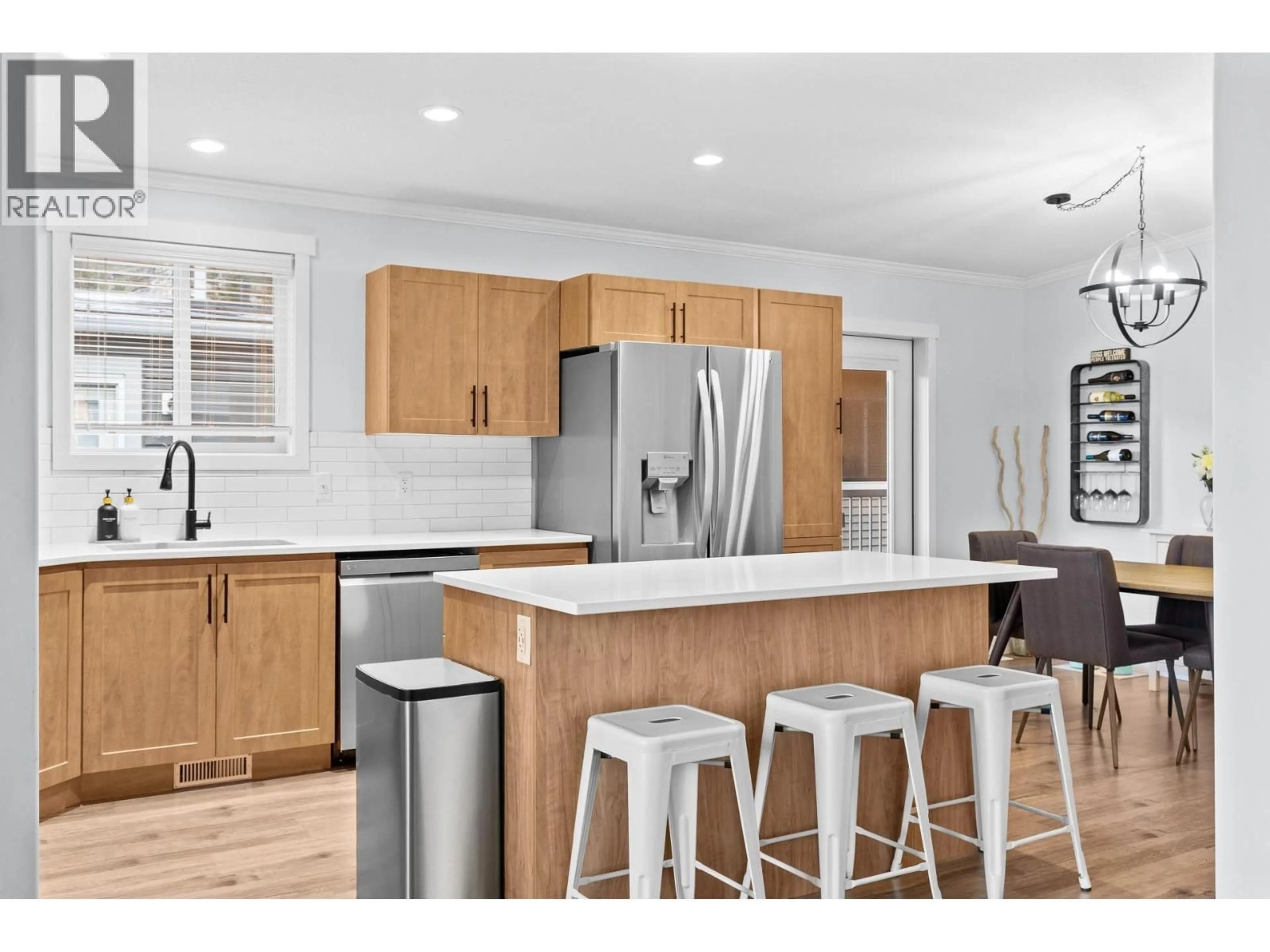 Open concept kitchen, wood/laminate floor for 35 - 1835 NANCEE WAY COURT, West Kelowna British Columbia V1Z4C1