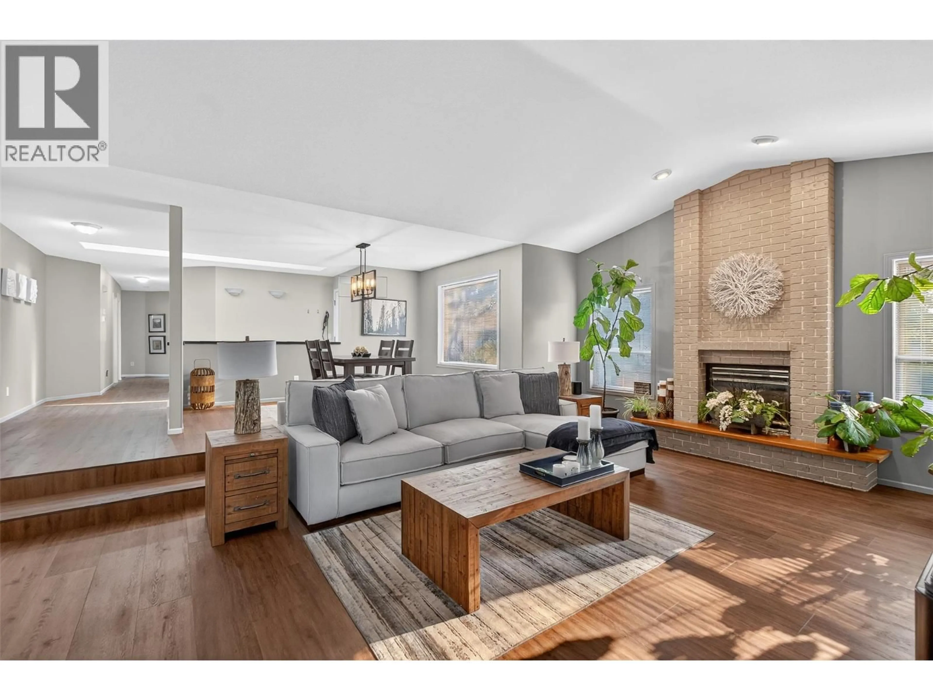 Living room with furniture, wood/laminate floor for 407 - 2330 BUTT ROAD, West Kelowna British Columbia V4T2L3