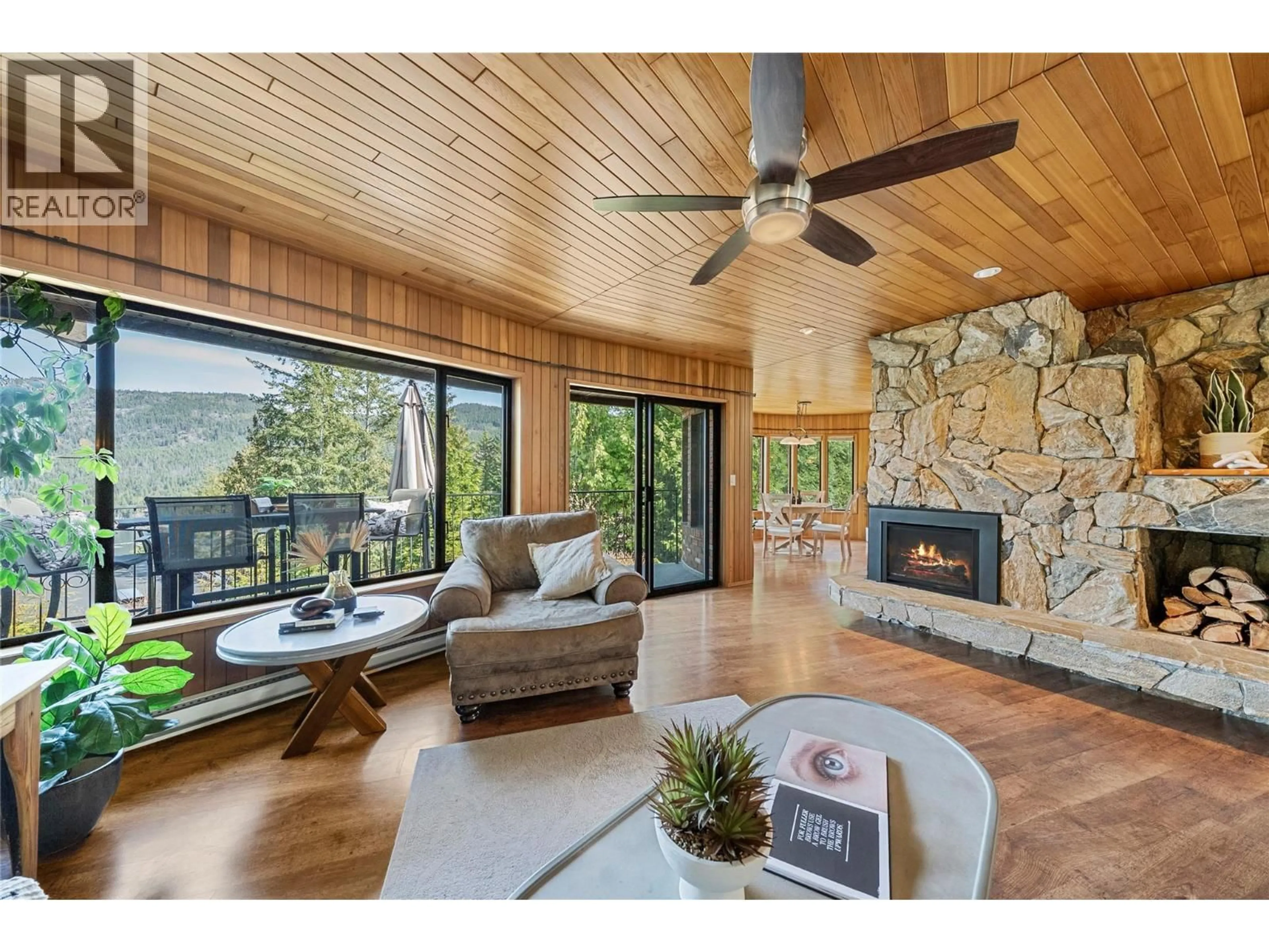 Living room with furniture, wood/laminate floor for 2631 GRAND VIEW PLACE, Blind Bay British Columbia