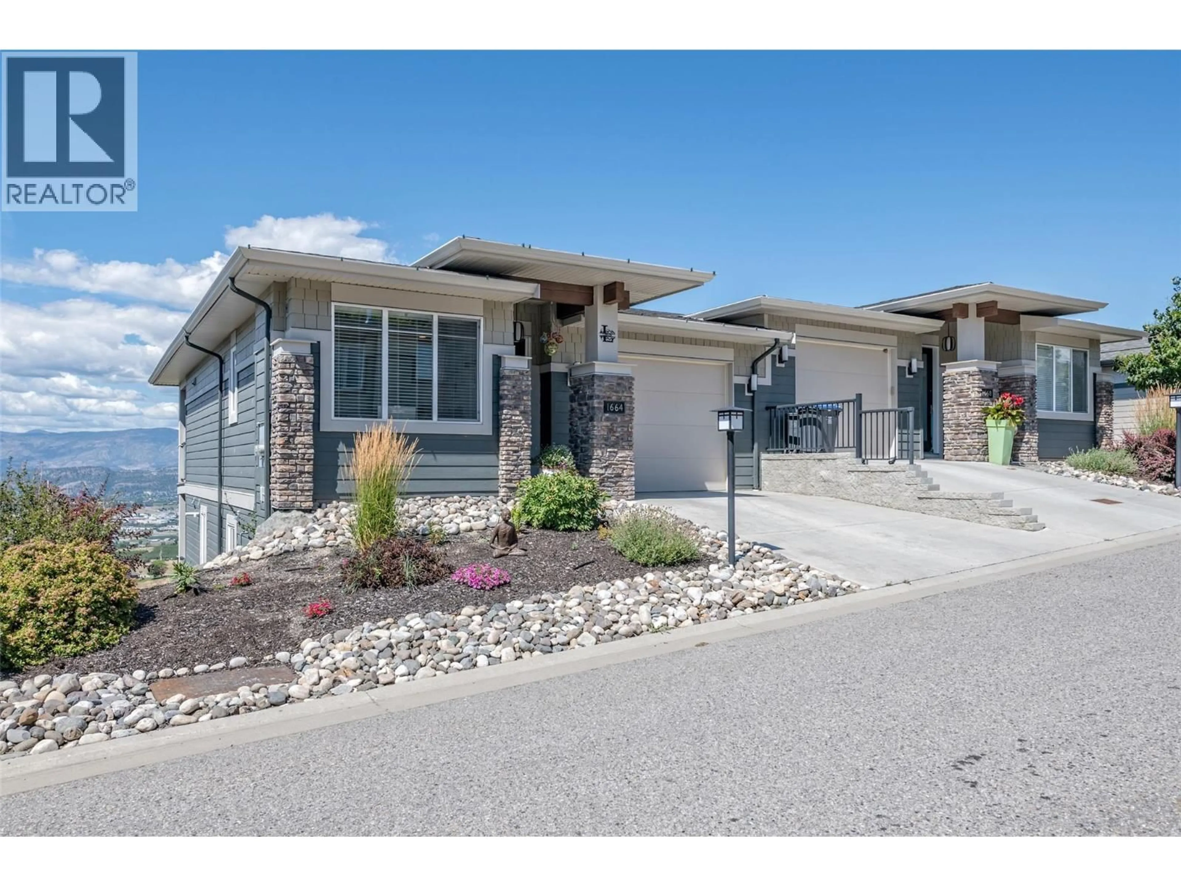 Home with vinyl exterior material, street for 1664 TOWER RANCH DRIVE, Kelowna British Columbia V1P1T8
