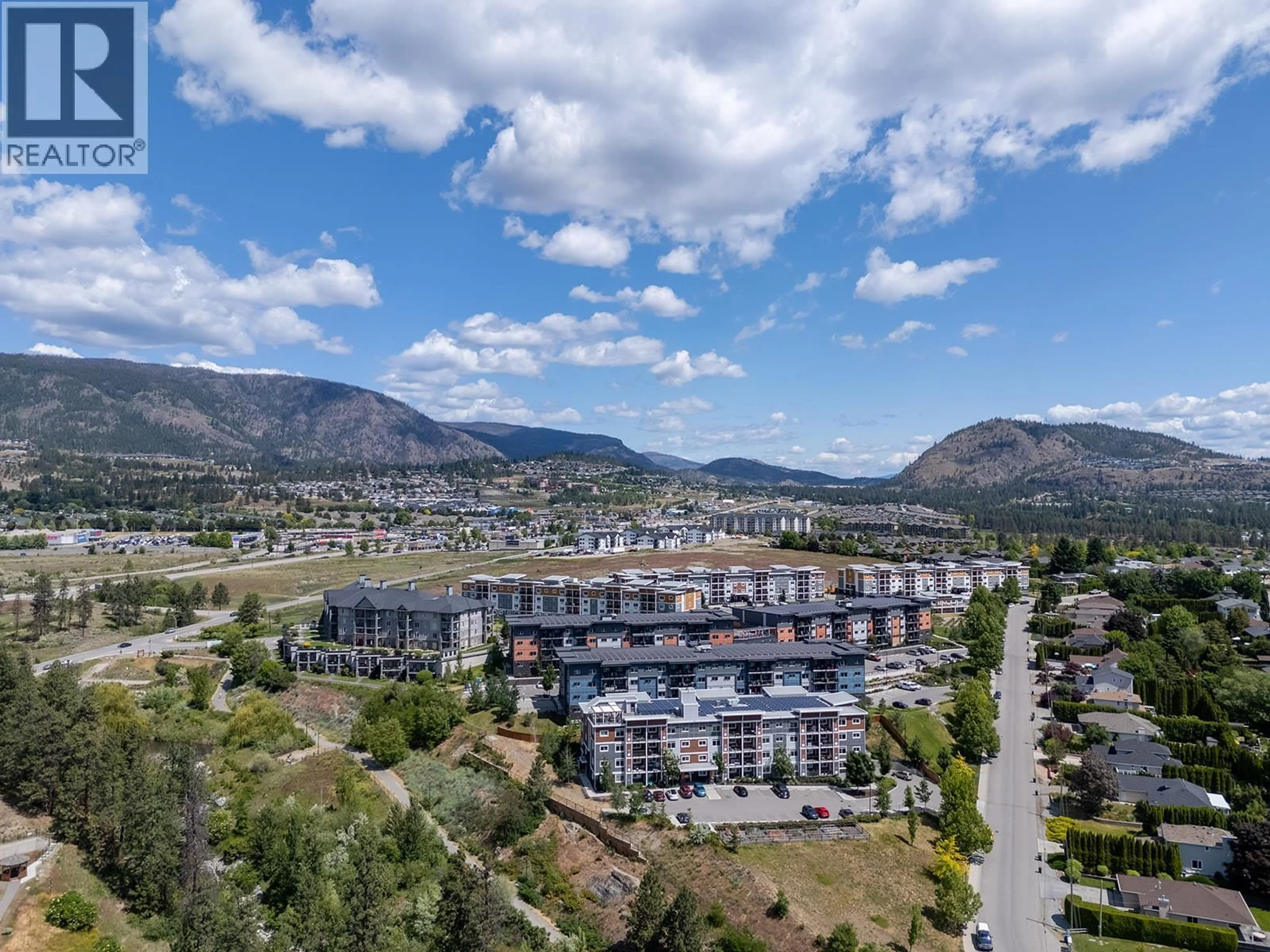 A pic from outside/outdoor area/front of a property/back of a property/a pic from drone, mountain view for 412 - 2250 MAJOROS ROAD, West Kelowna British Columbia V4T0A6