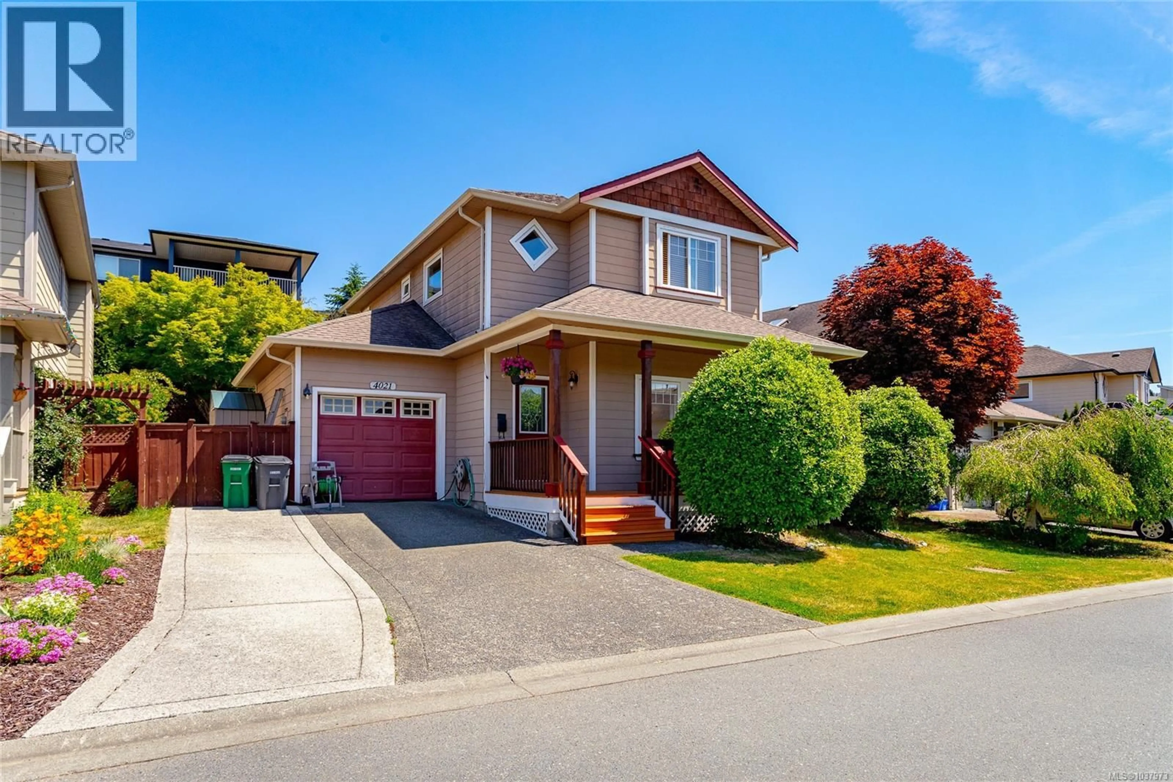 Home with vinyl exterior material, street for 4021 BLACKBERRY LANE, Saanich British Columbia V8X5J4