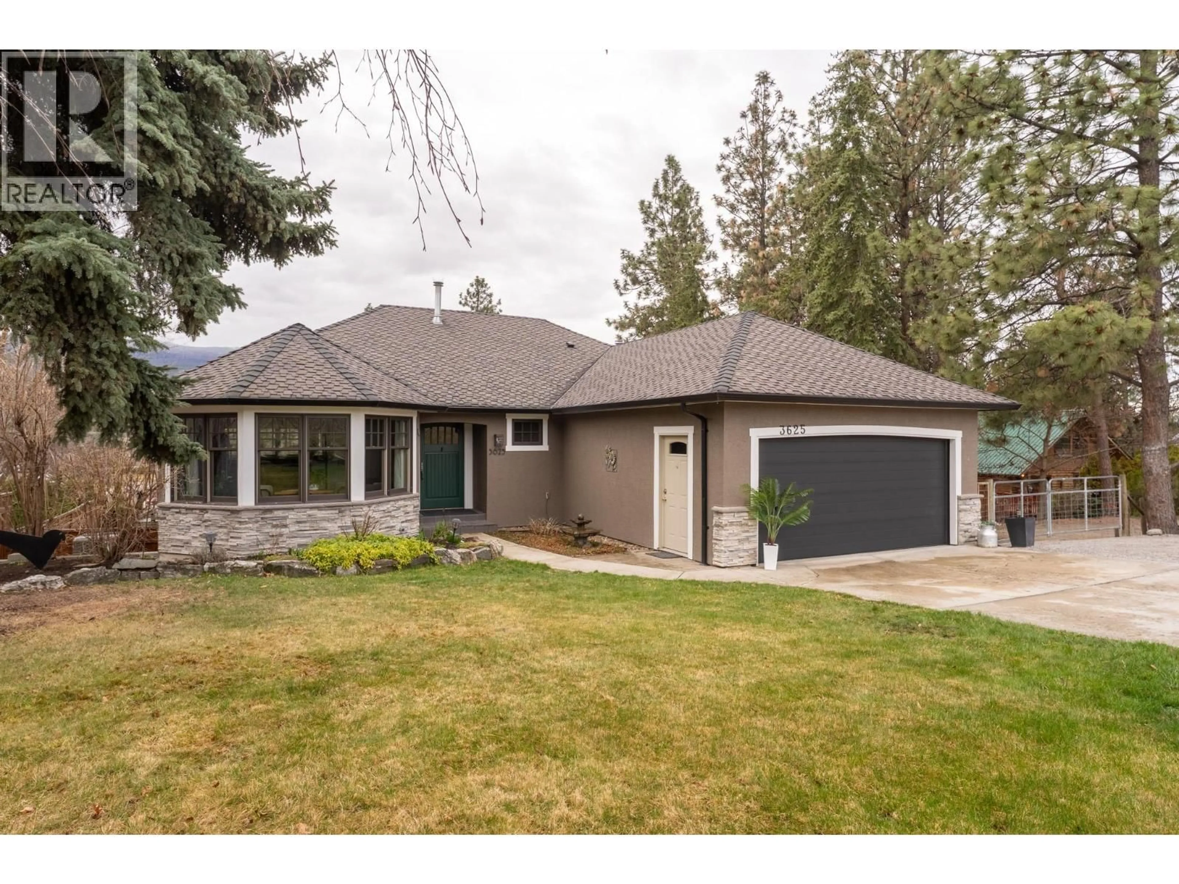 Home with brick exterior material, street for 3625 WATER ROAD, Kelowna British Columbia V1W4G2