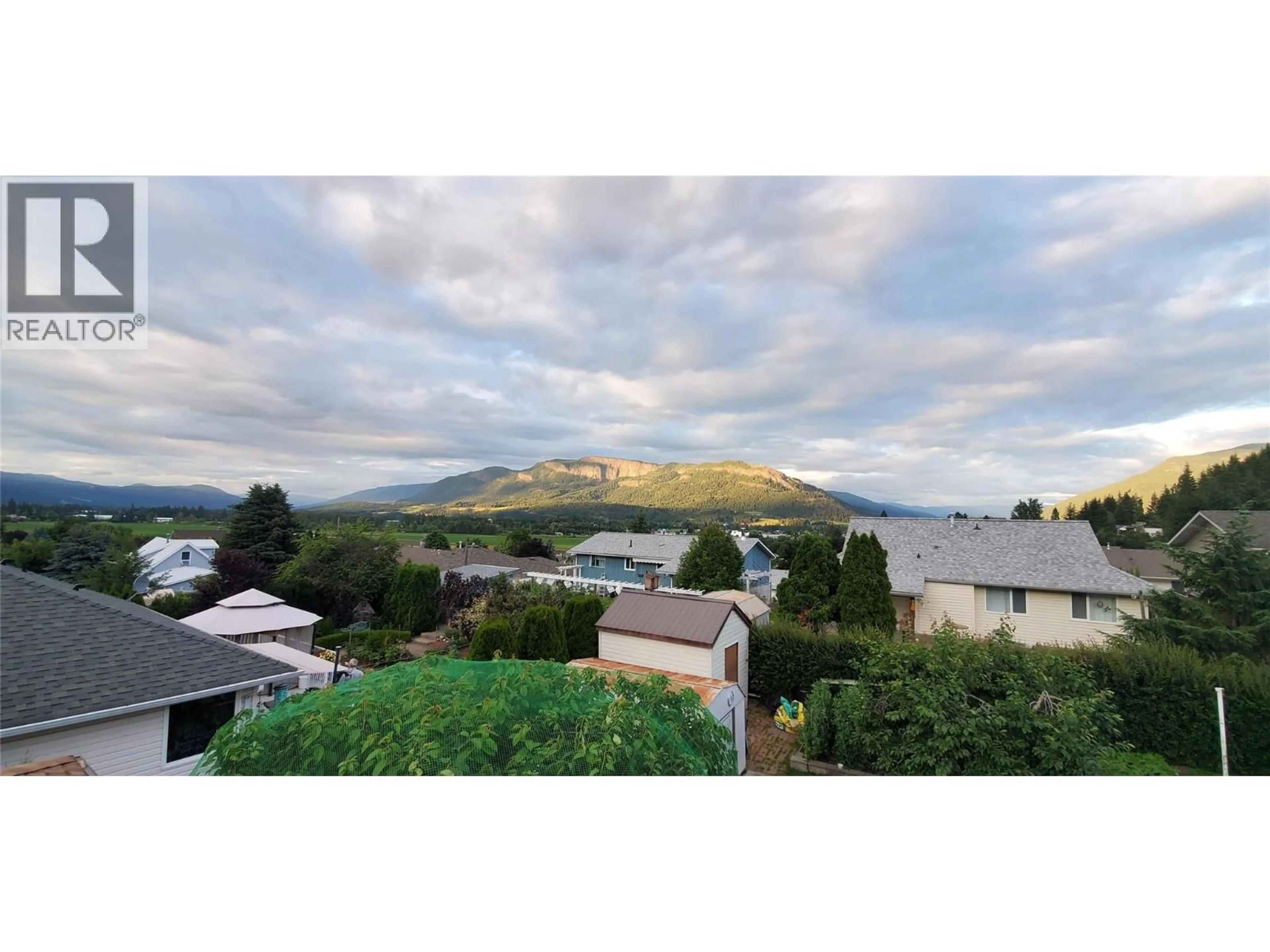 A pic from outside/outdoor area/front of a property/back of a property/a pic from drone, mountain view for 32 PRESTON CRESCENT, Enderby British Columbia V4Y4C5