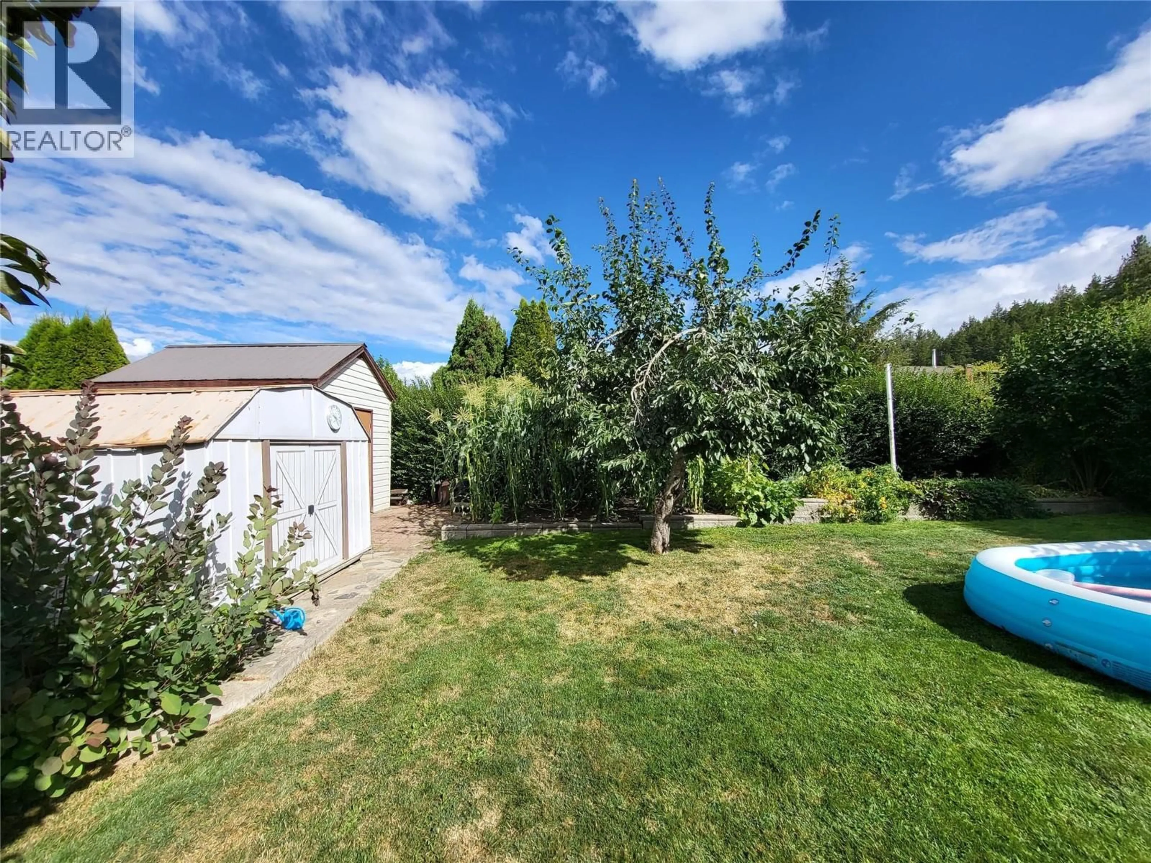 A pic from outside/outdoor area/front of a property/back of a property/a pic from drone, unknown for 32 PRESTON CRESCENT, Enderby British Columbia V4Y4C5