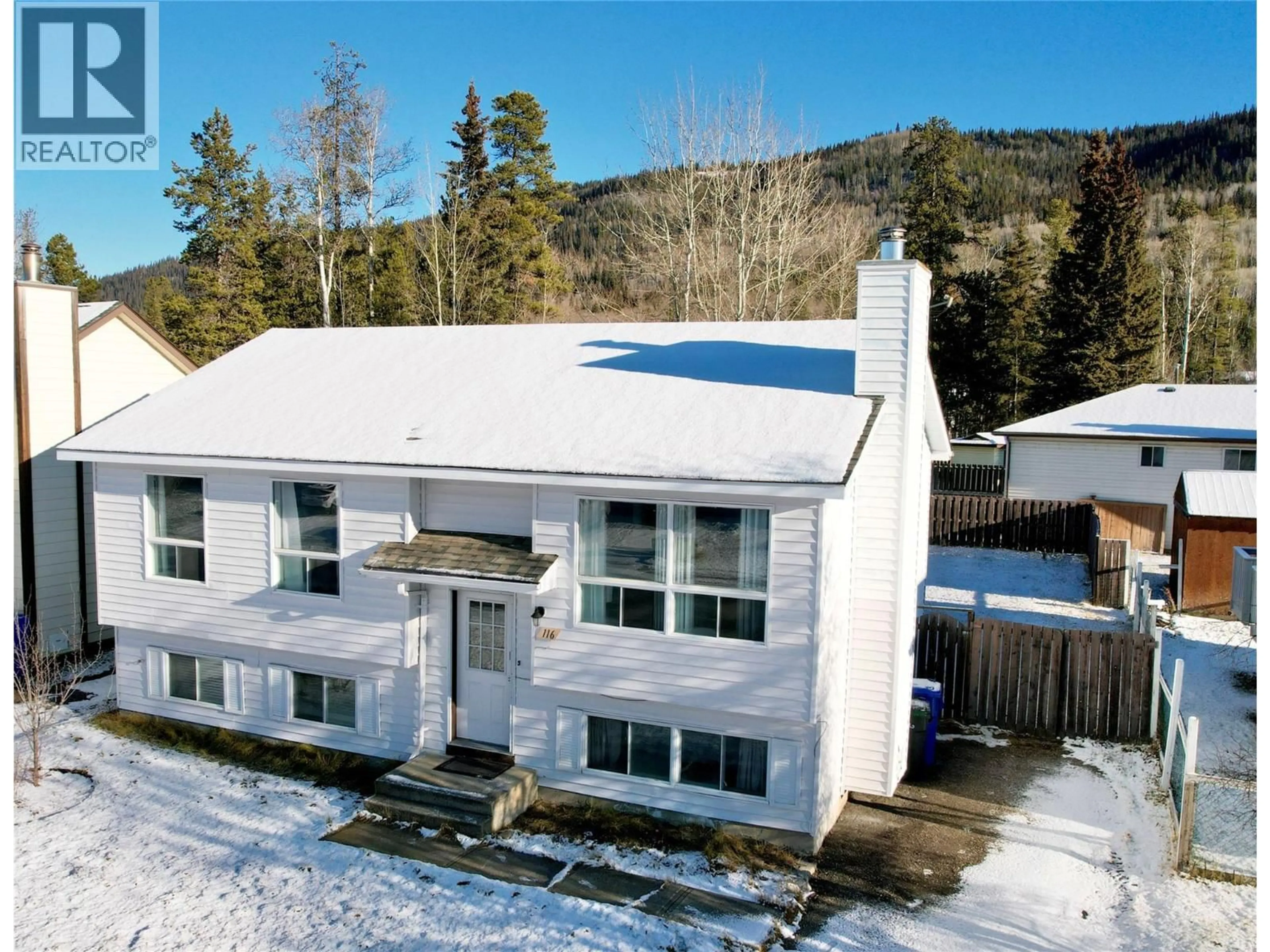 A pic from outside/outdoor area/front of a property/back of a property/a pic from drone, building for 116 WOLVERINE AVENUE, Tumbler Ridge British Columbia V0C2W0