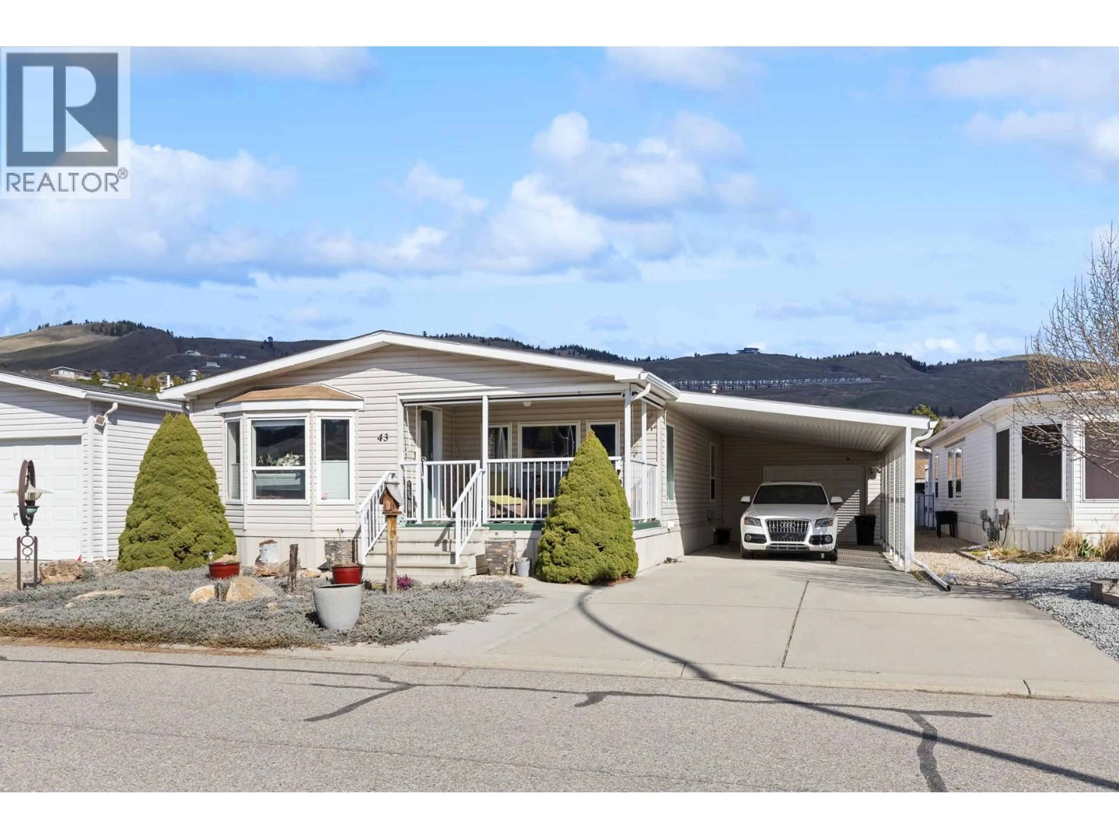 Home with vinyl exterior material, street for 43 - 6688 TRONSON ROAD, Vernon British Columbia V1H1R9