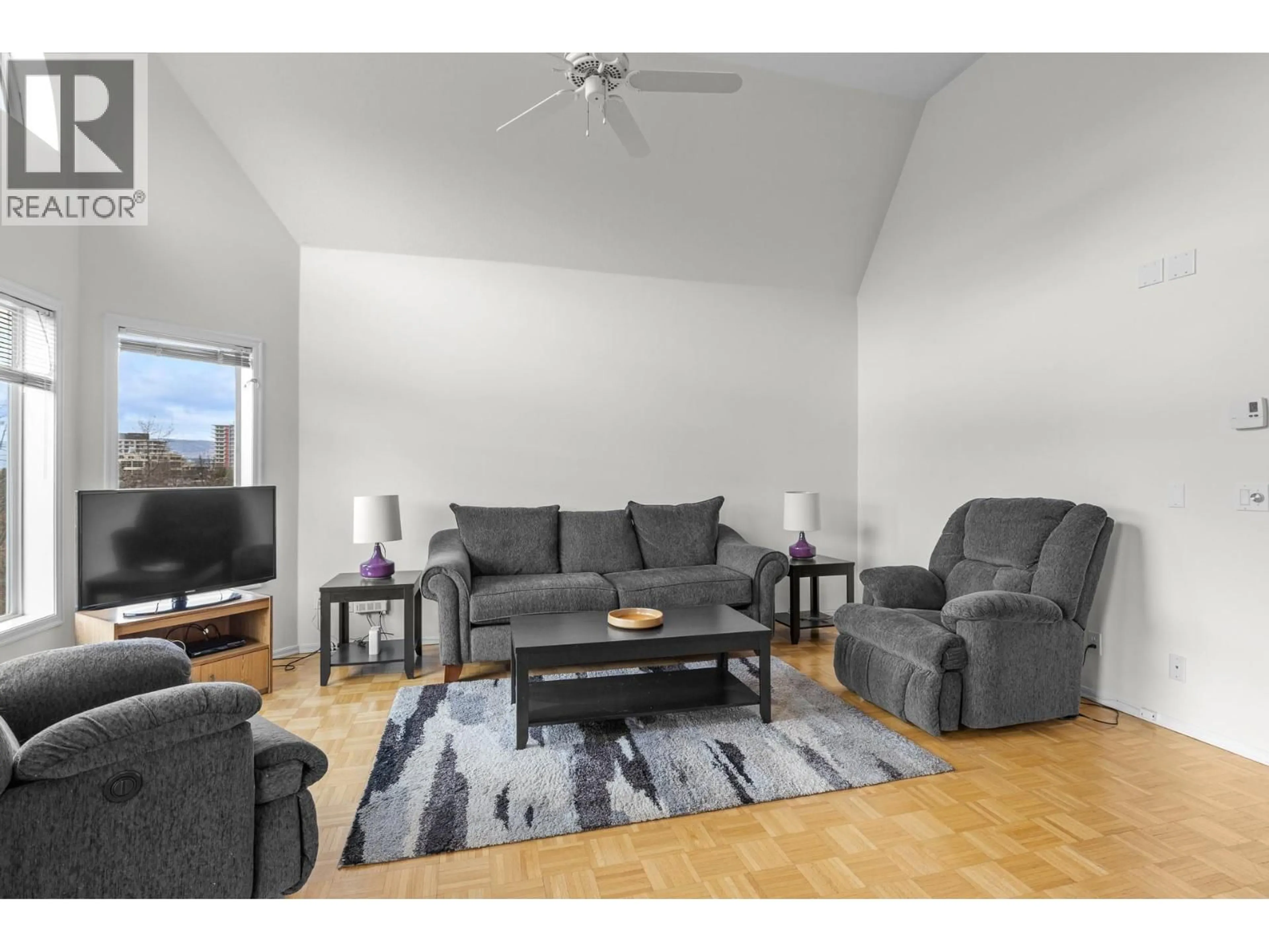 Living room with furniture, unknown for 306 - 877 KLO ROAD, Kelowna British Columbia V1Y9R1