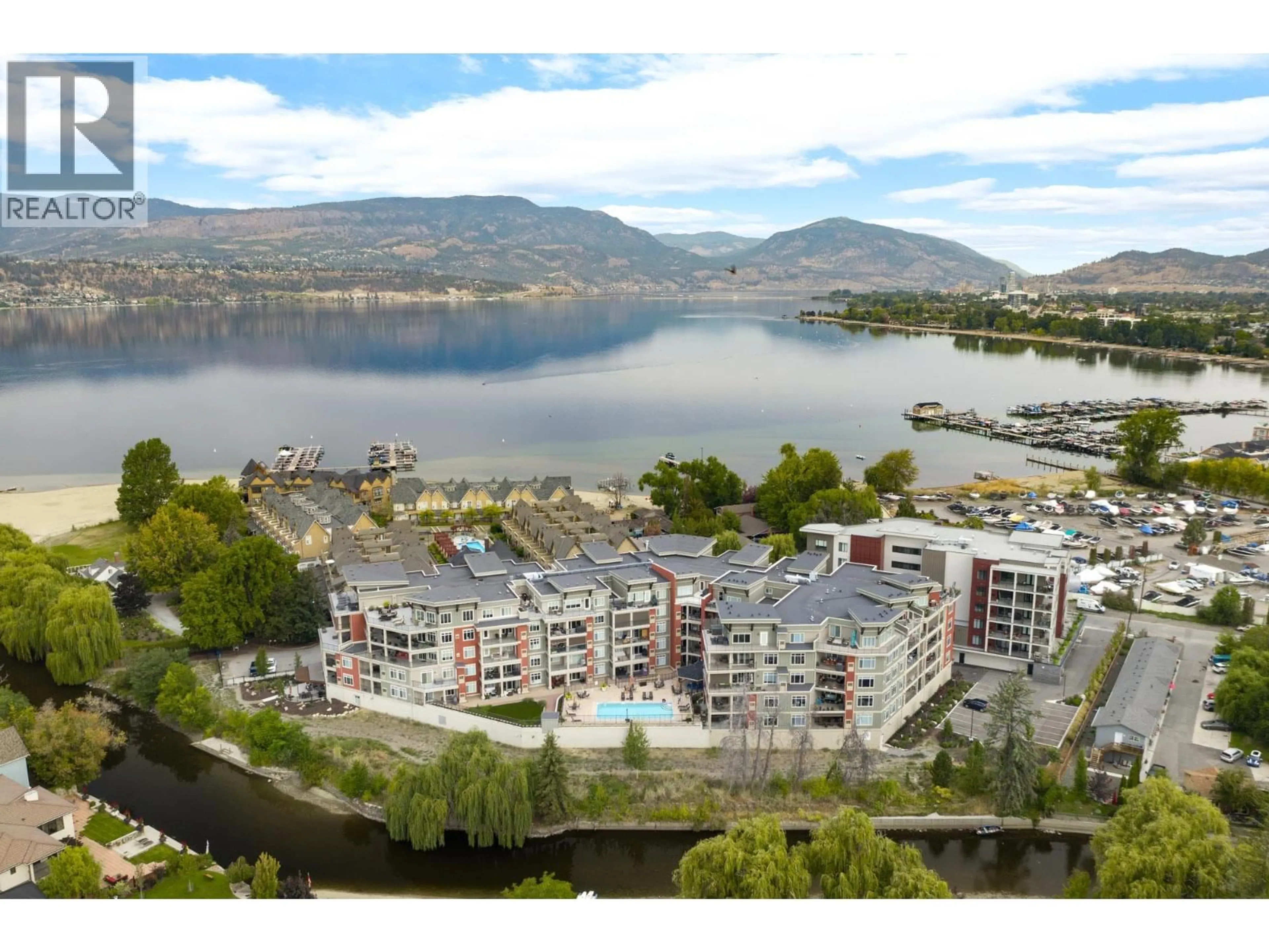 A pic from outside/outdoor area/front of a property/back of a property/a pic from drone, water/lake/river/ocean view for 415 - 3865 TRUSWELL ROAD, Kelowna British Columbia V1W3K9