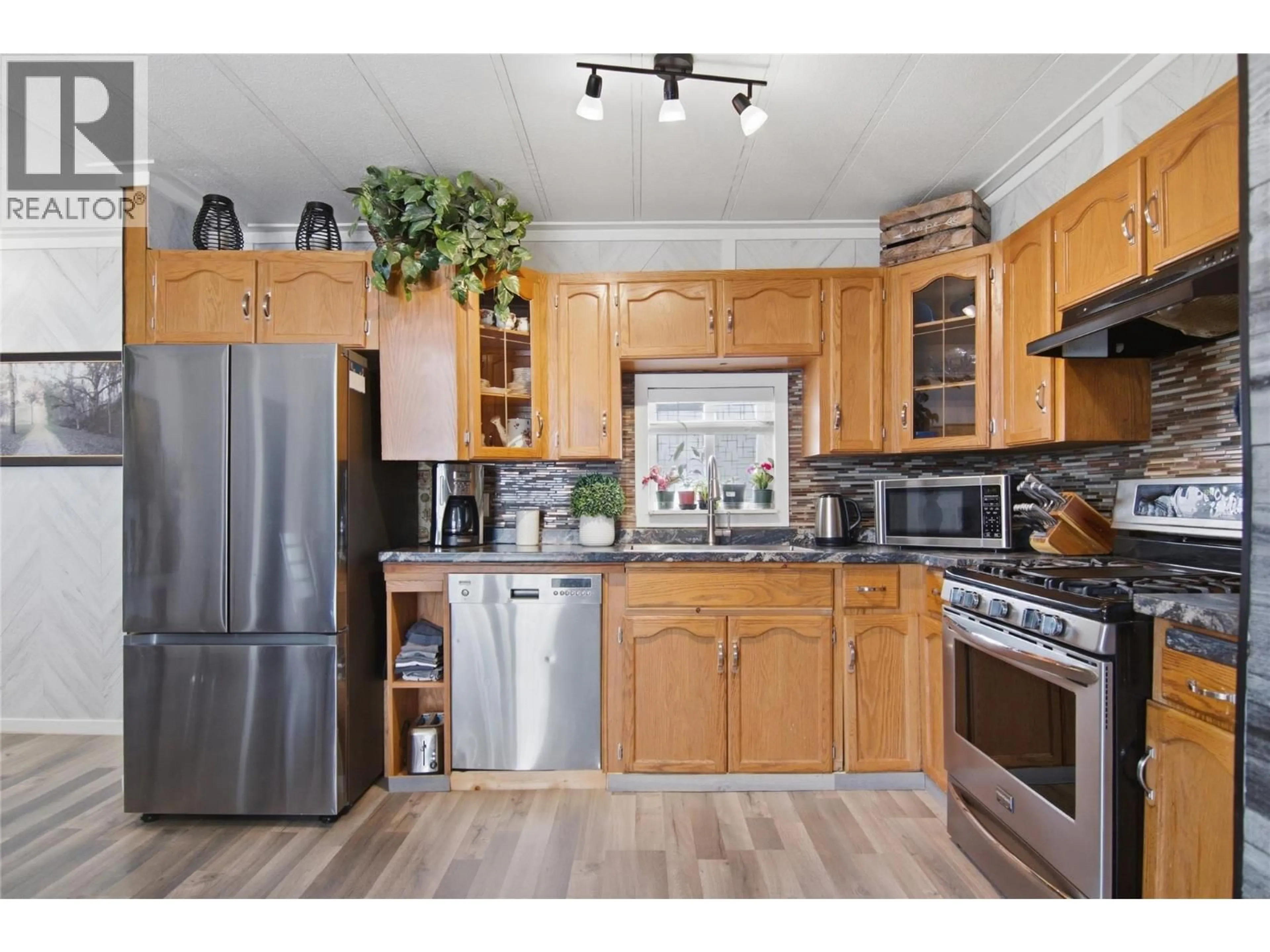 Standard kitchen, wood/laminate floor for 7 - 4796 TRANS CANADA  W HIGHWAY, Kamloops British Columbia V1S2A8