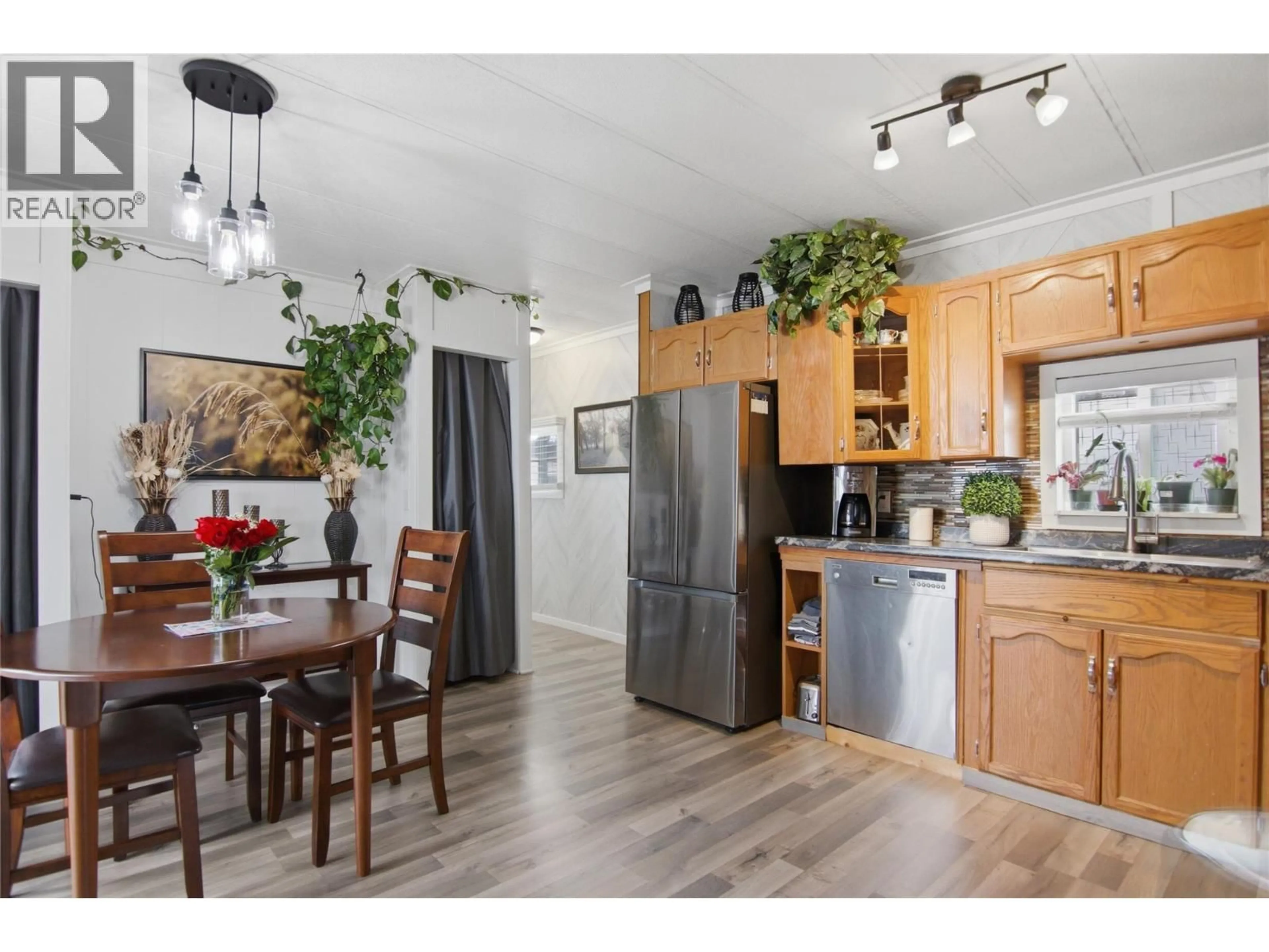 Open concept kitchen, wood/laminate floor for 7 - 4796 TRANS CANADA  W HIGHWAY, Kamloops British Columbia V1S2A8