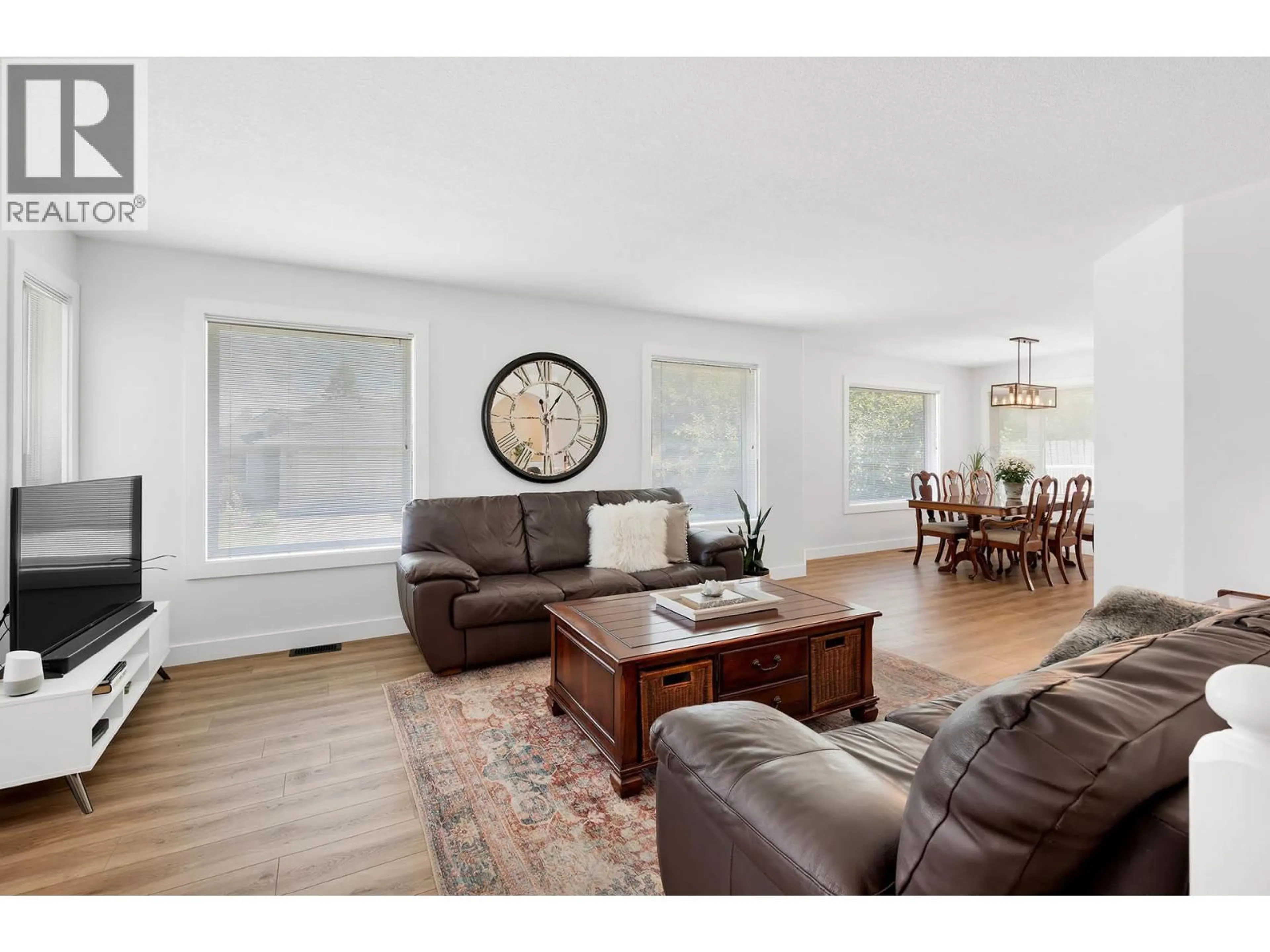 Living room with furniture, wood/laminate floor for 11 - 1350 FINLAY AVENUE, Kamloops British Columbia V2E2N3