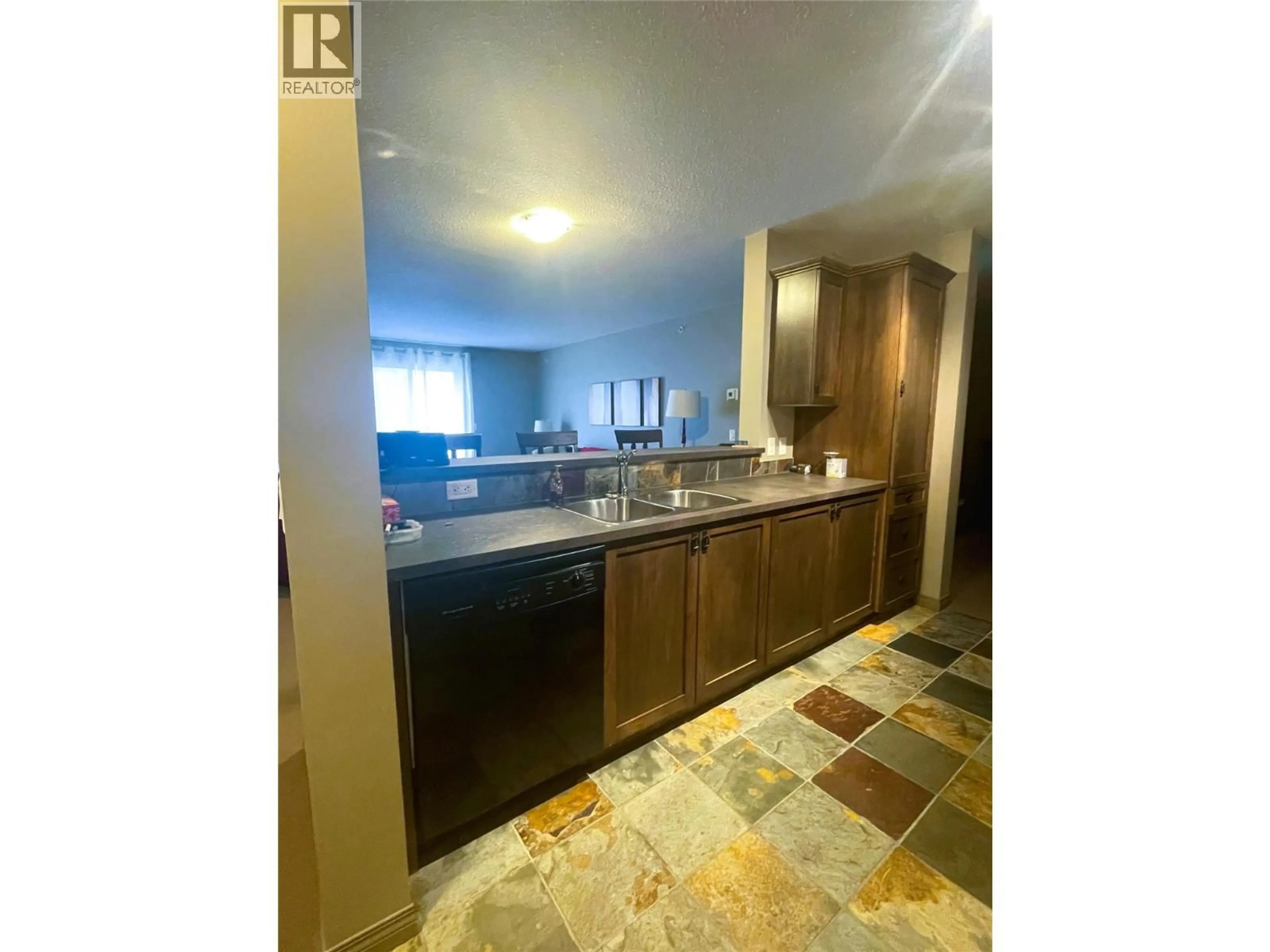 Open concept kitchen, ceramic/tile floor for 407 - 4884 STANLEY STREET, Radium Hot Springs British Columbia V0A1M0