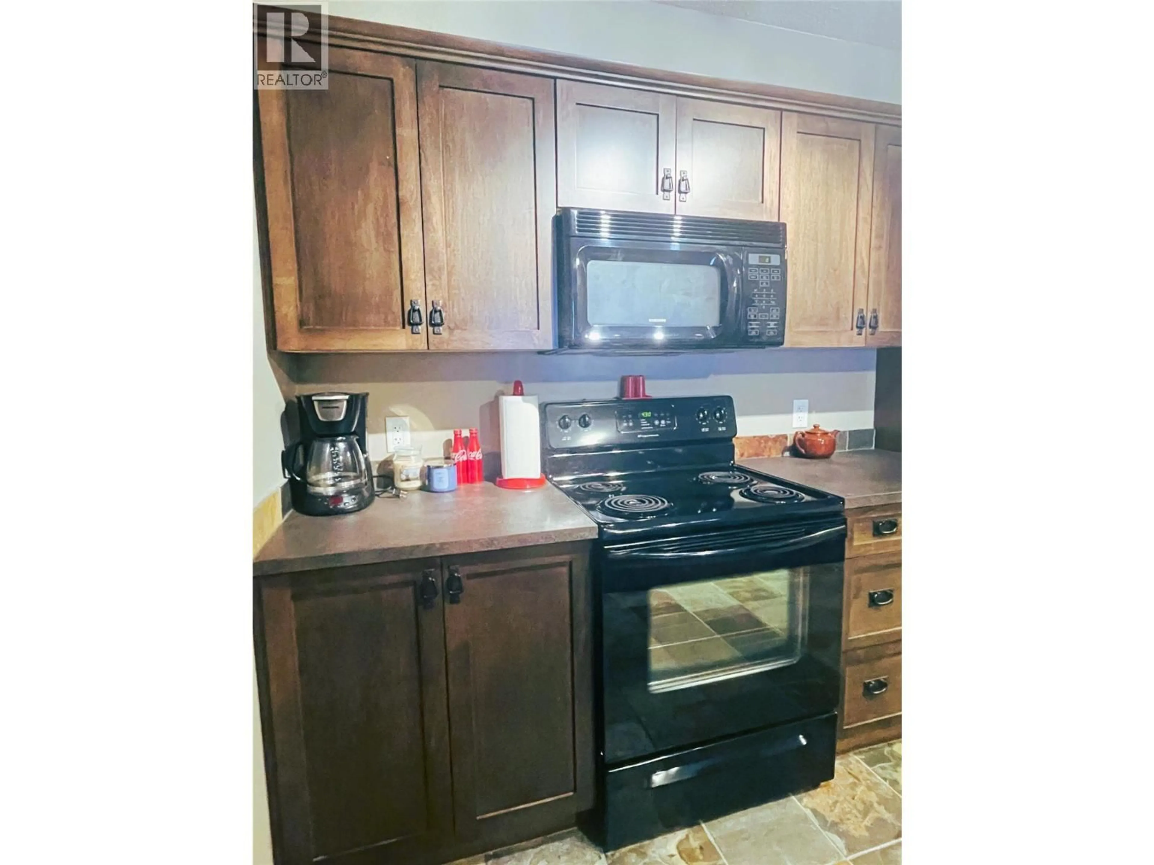 Standard kitchen, wood/laminate floor for 407 - 4884 STANLEY STREET, Radium Hot Springs British Columbia V0A1M0