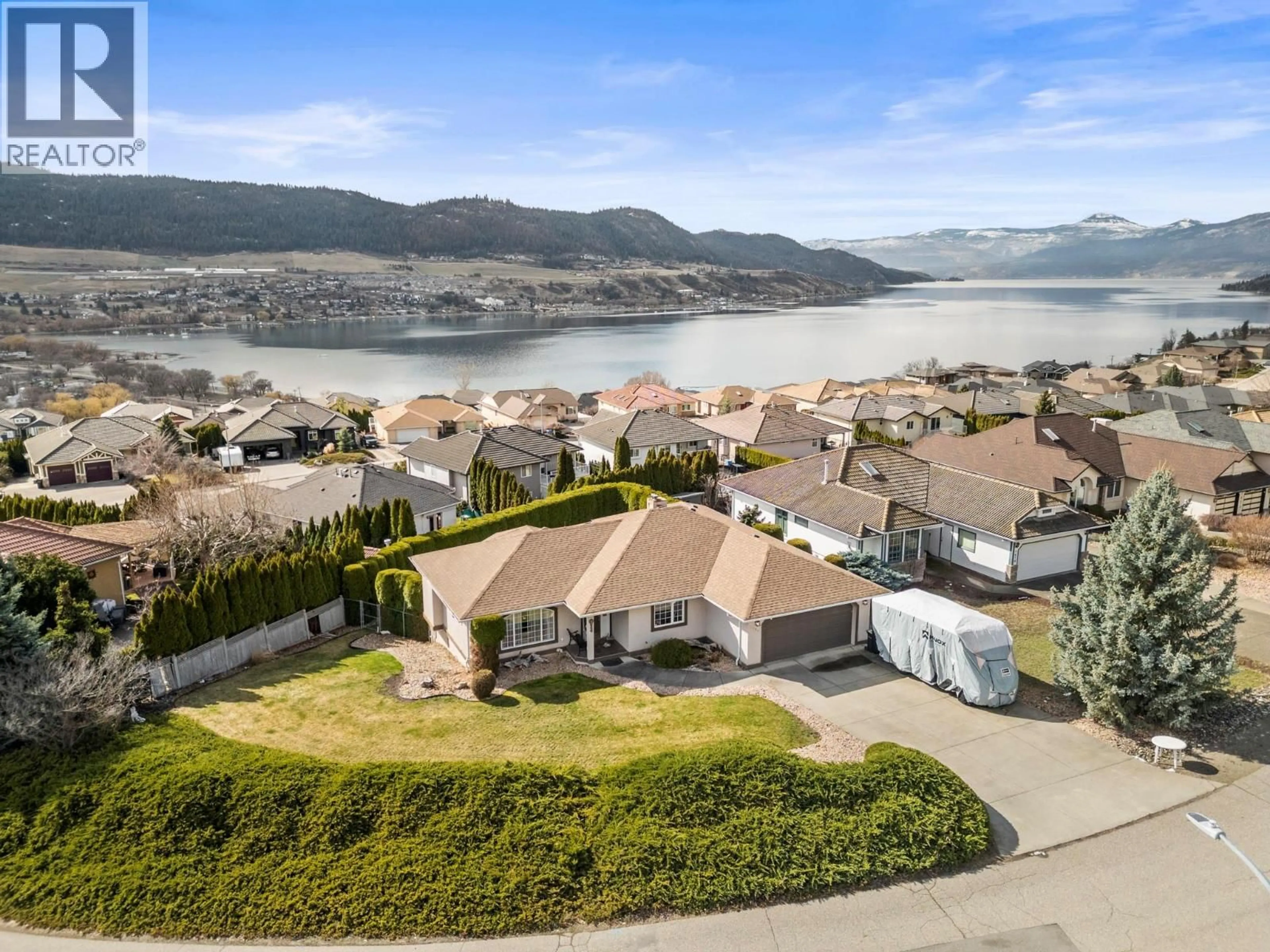 A pic from outside/outdoor area/front of a property/back of a property/a pic from drone, water/lake/river/ocean view for 7064 AMBER DRIVE, Vernon British Columbia V1H1P4