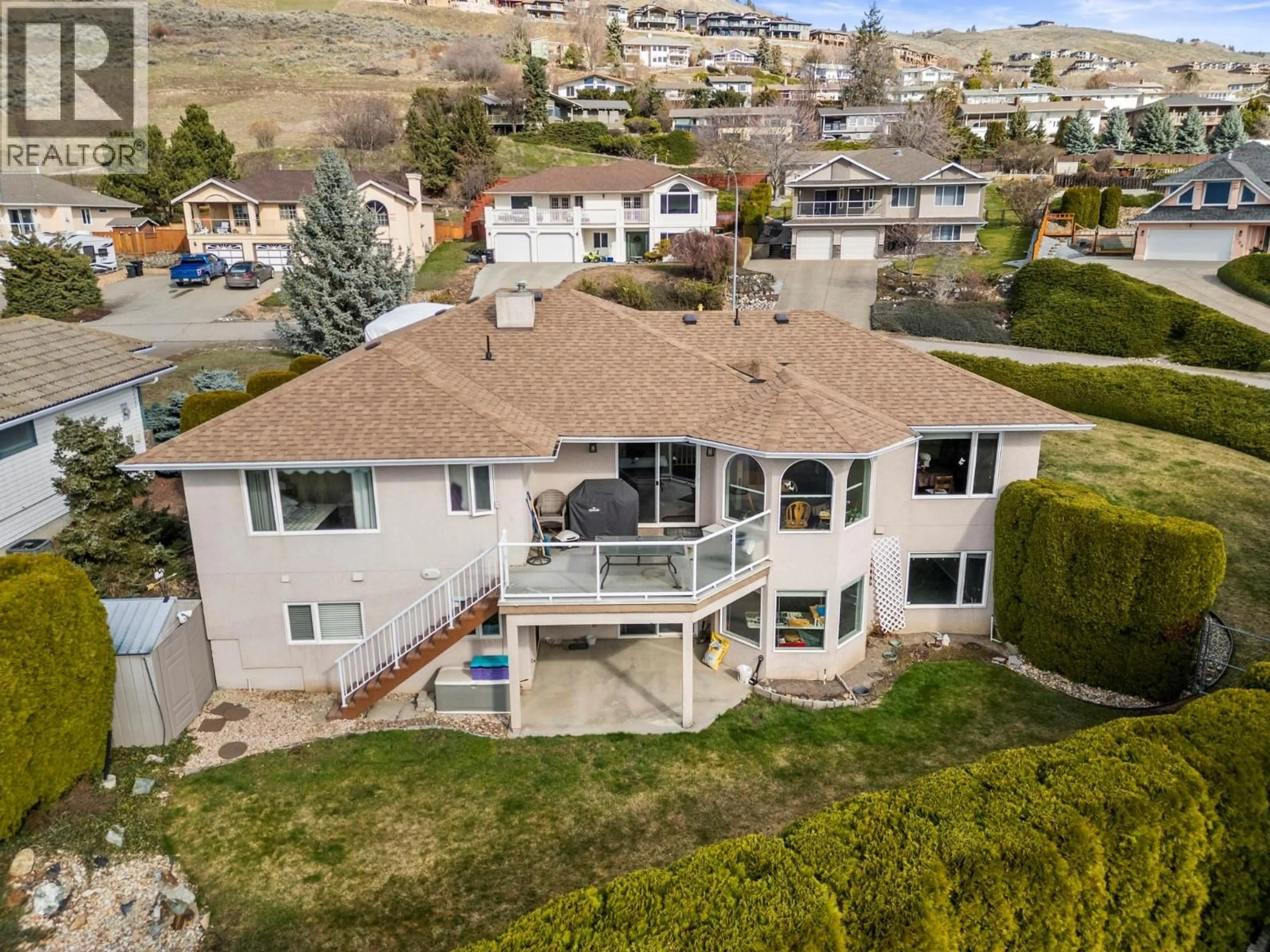 A pic from outside/outdoor area/front of a property/back of a property/a pic from drone, water/lake/river/ocean view for 7064 AMBER DRIVE, Vernon British Columbia V1H1P4