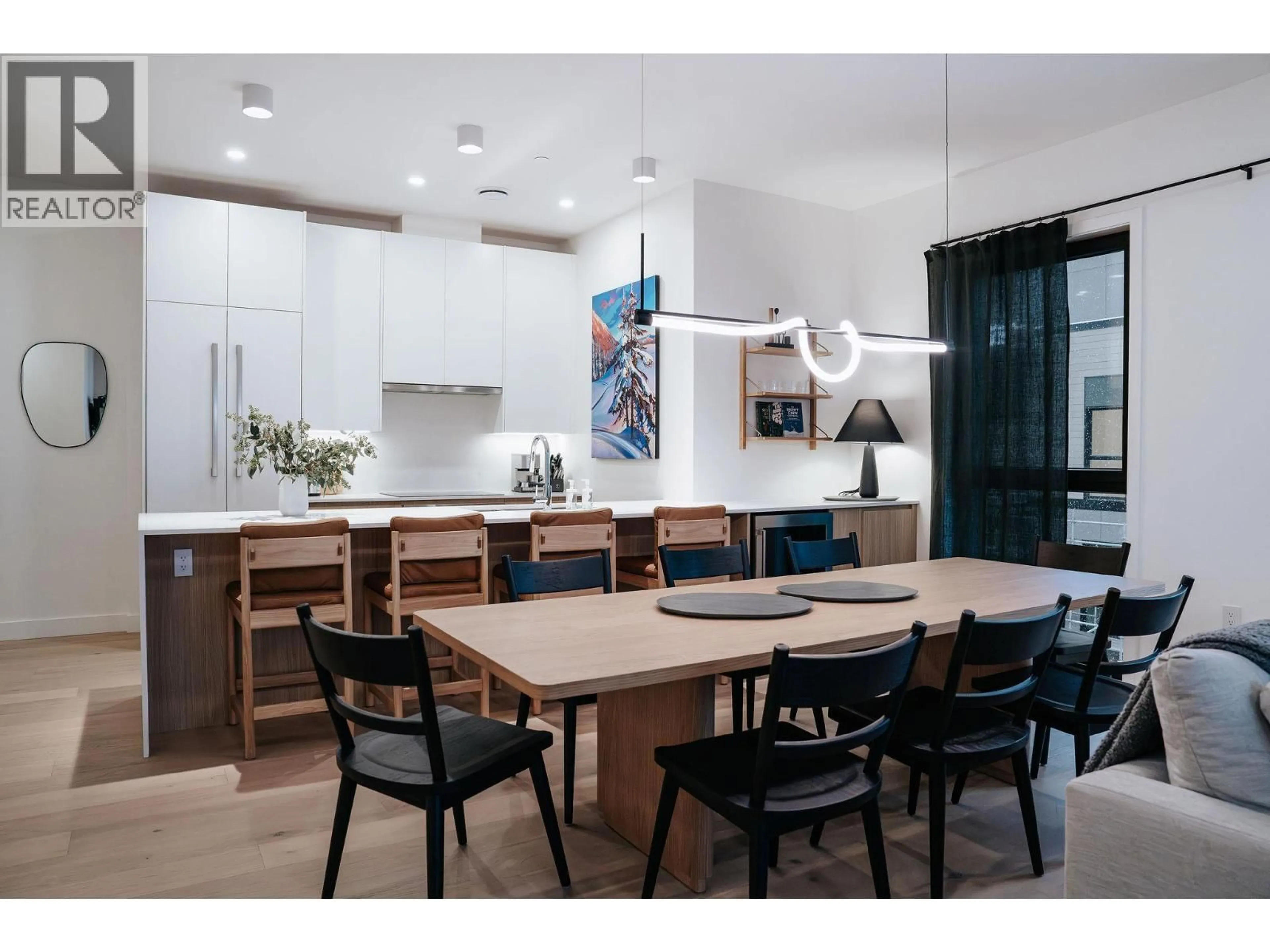 Contemporary kitchen, wood/laminate floor for 2501 - 1702 COURSIER AVENUE, Revelstoke British Columbia V0E2S1