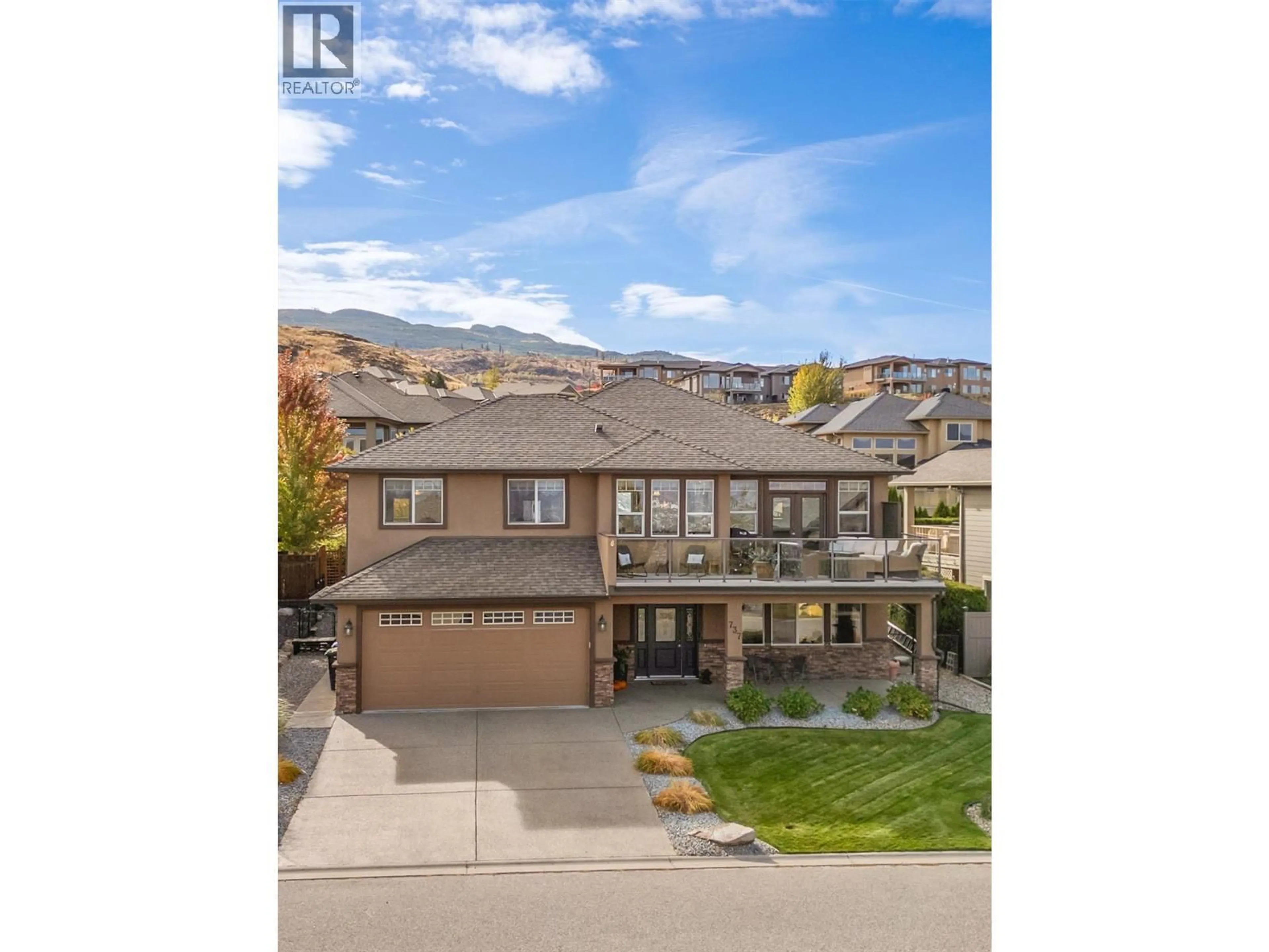 A pic from outside/outdoor area/front of a property/back of a property/a pic from drone, unknown for 737 KUIPERS CRESCENT, Kelowna British Columbia V1W5H4
