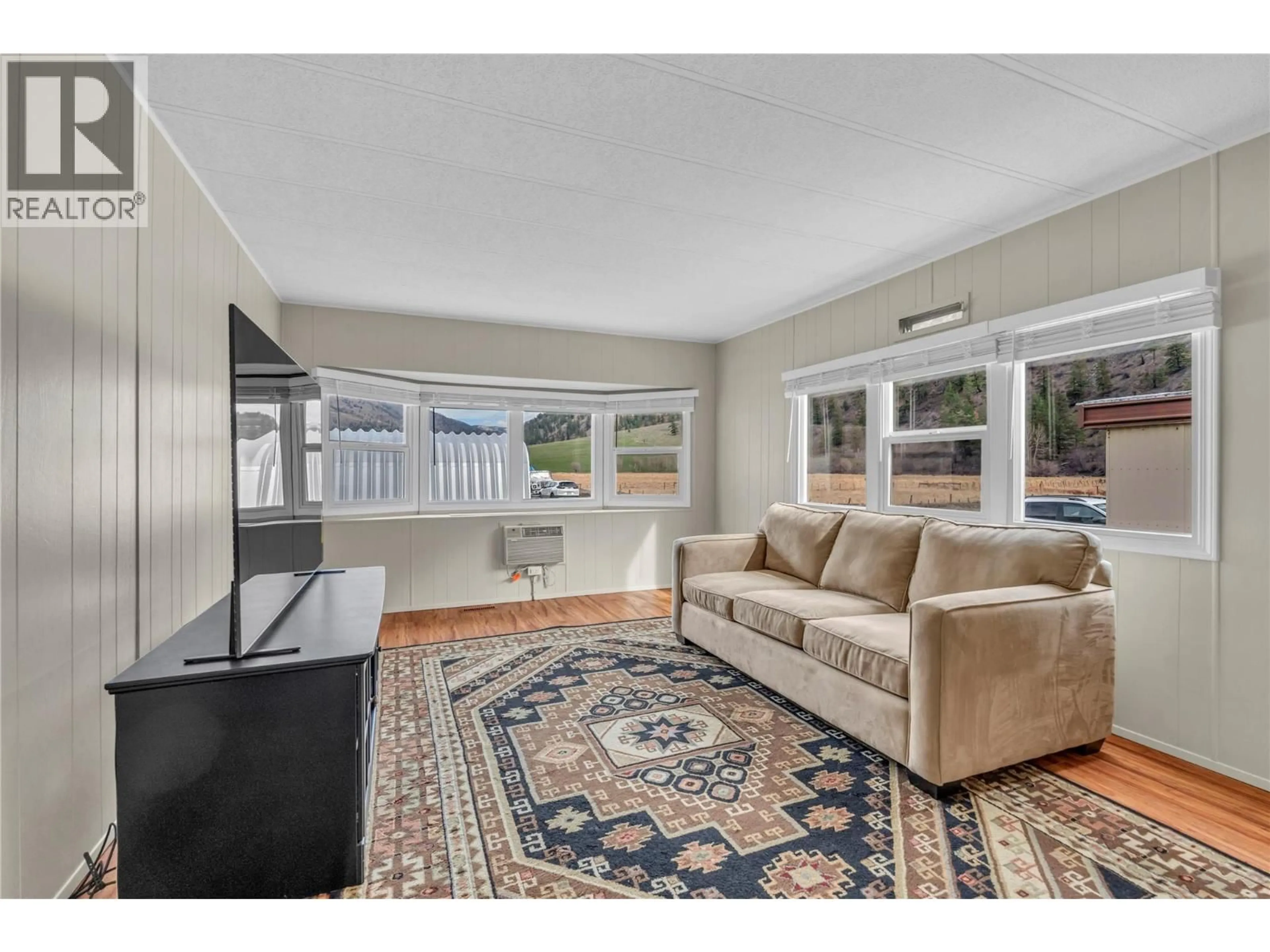 Living room with furniture, unknown for 2657 1ST STREET, Olalla British Columbia V0X1N6