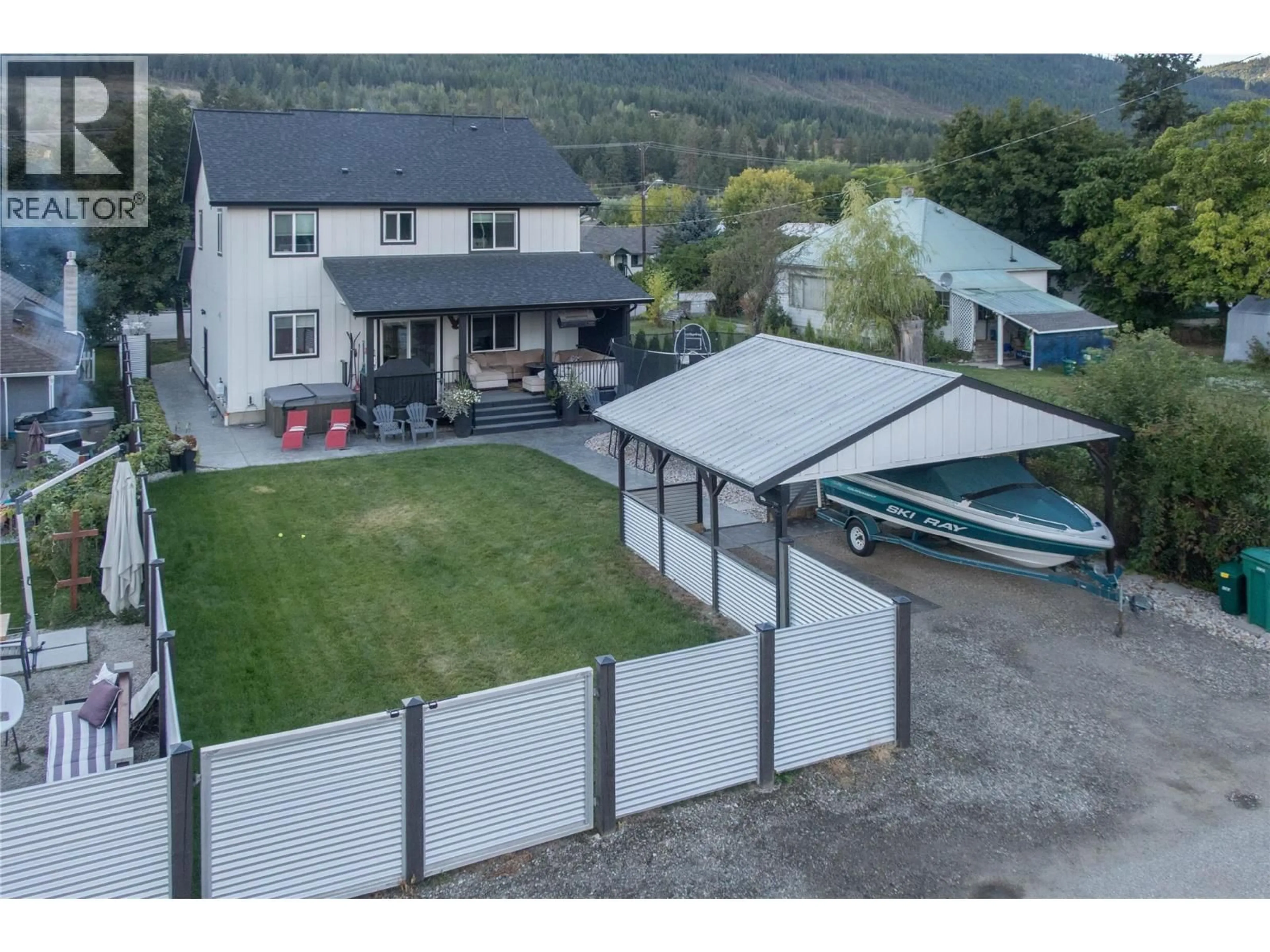 A pic from outside/outdoor area/front of a property/back of a property/a pic from drone, mountain view for 2253 SHUSWAP AVENUE, Lumby British Columbia V0E2G0