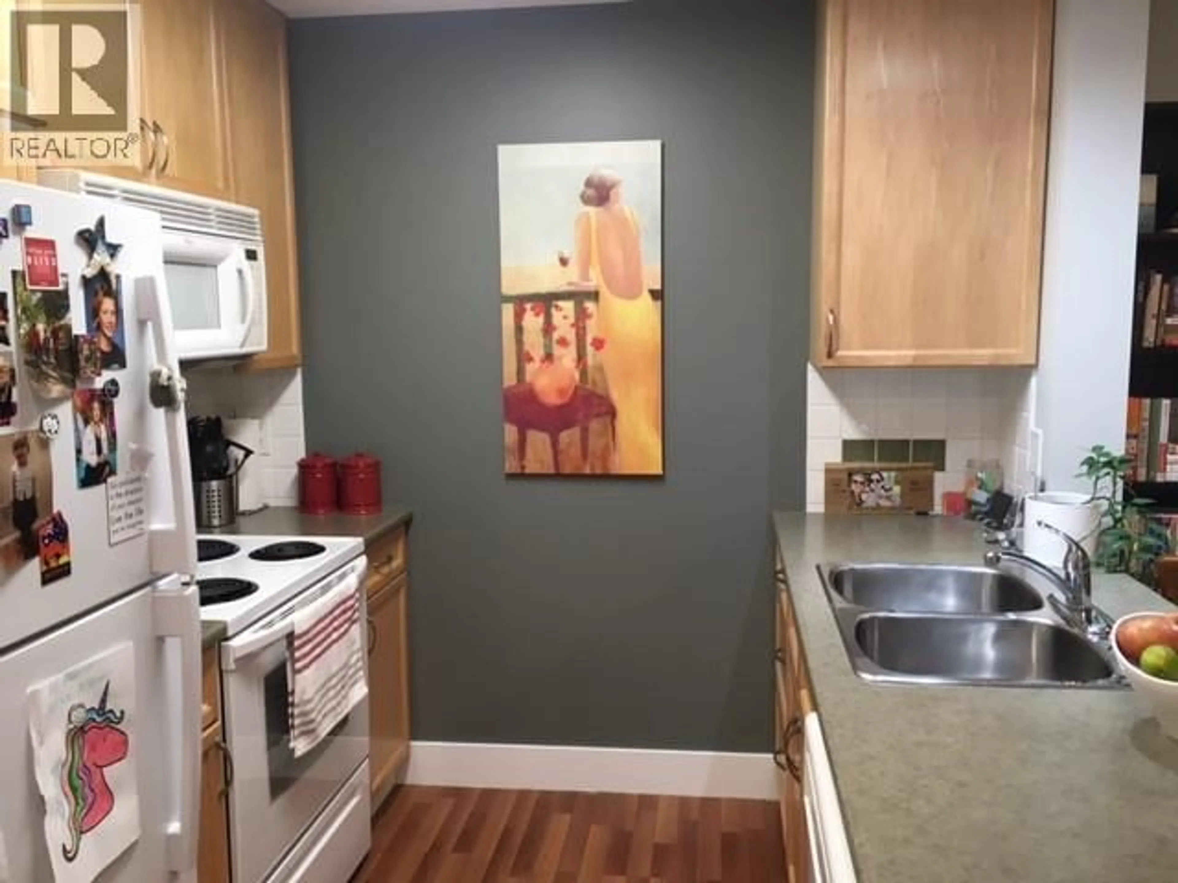 Standard kitchen, wood/laminate floor for 301 - 256 HASTINGS AVENUE, Penticton British Columbia V2A2V6