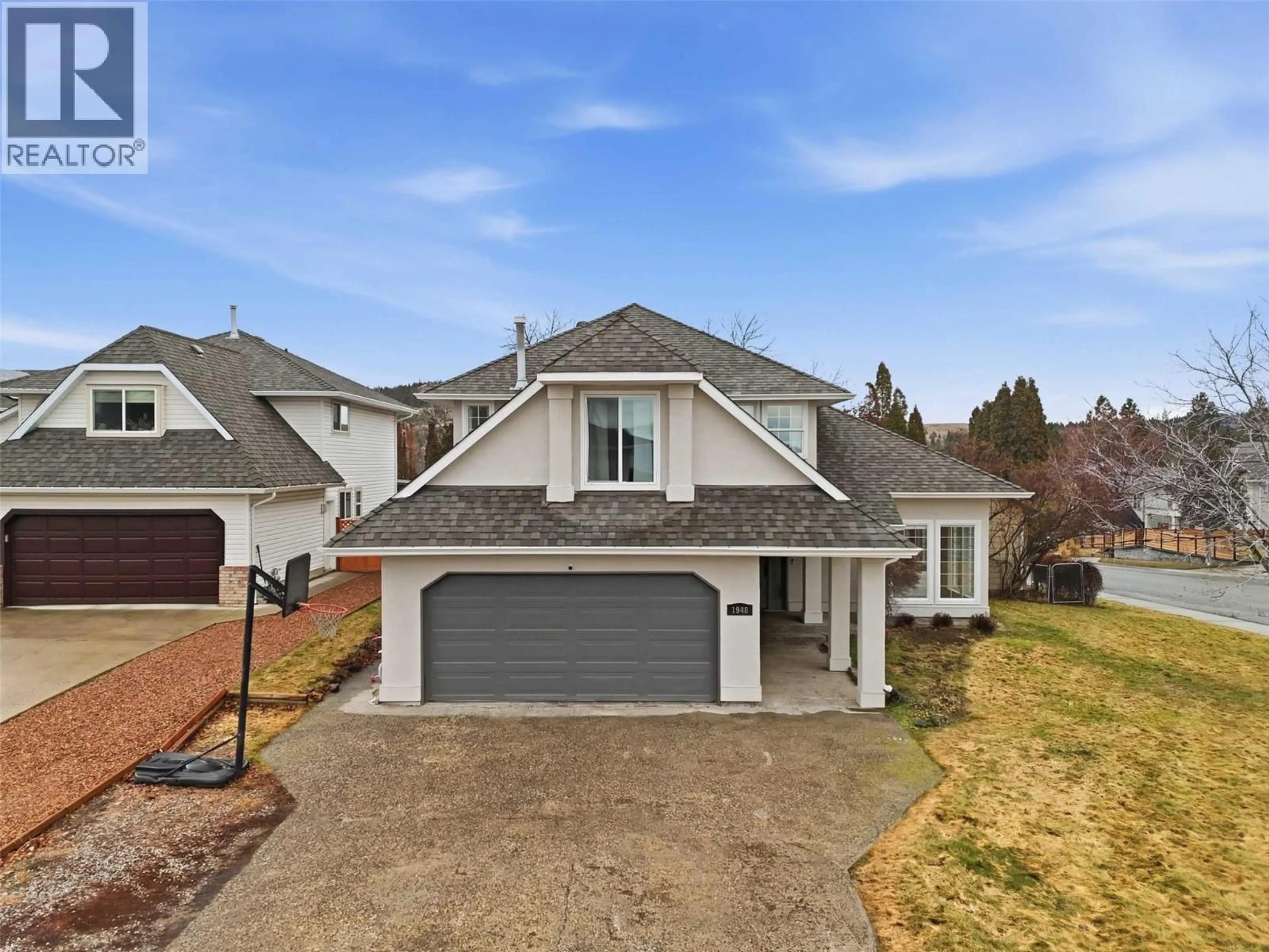 A pic from outside/outdoor area/front of a property/back of a property/a pic from drone, street for 1948 SHEFFIELD WAY, Kamloops British Columbia V2E2M2