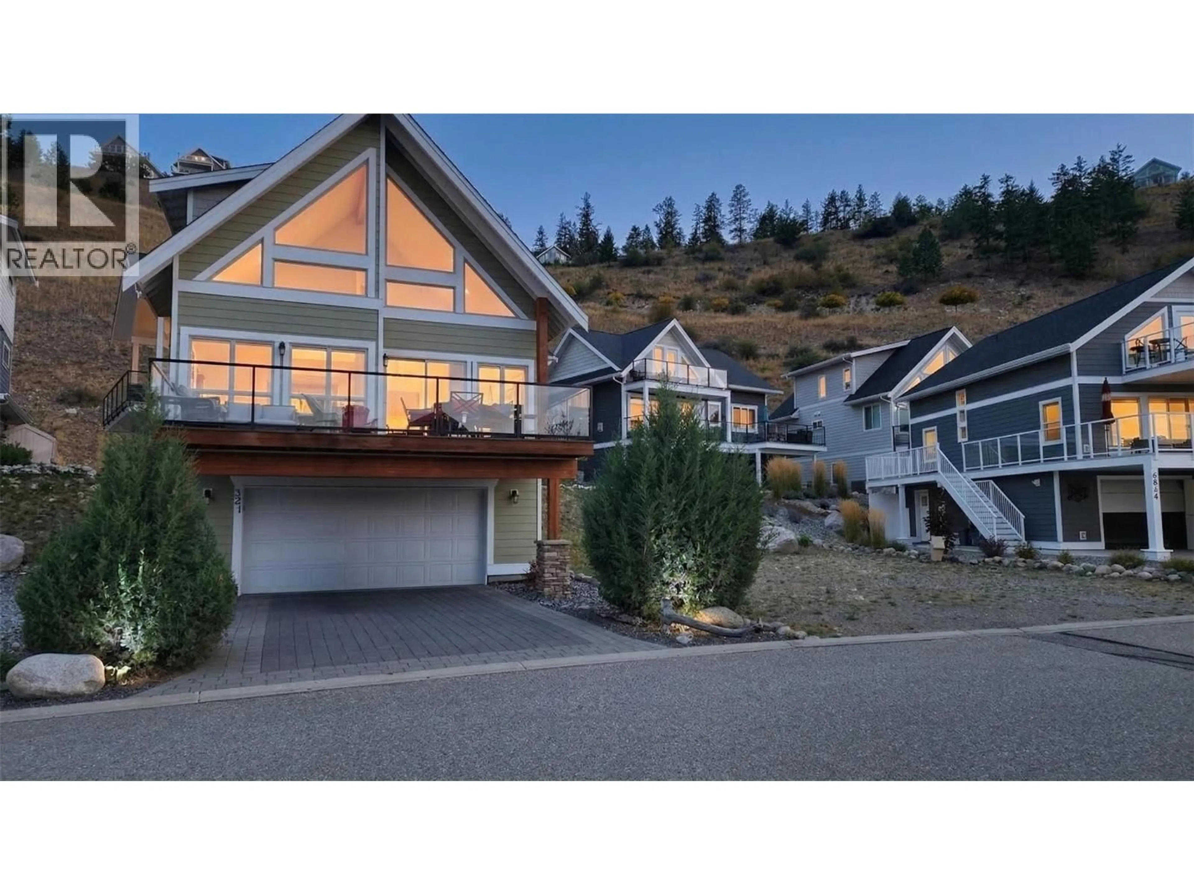 Home with vinyl exterior material, mountain view for 321 - 6844 MADRID WAY, Fintry British Columbia V1Z3R8