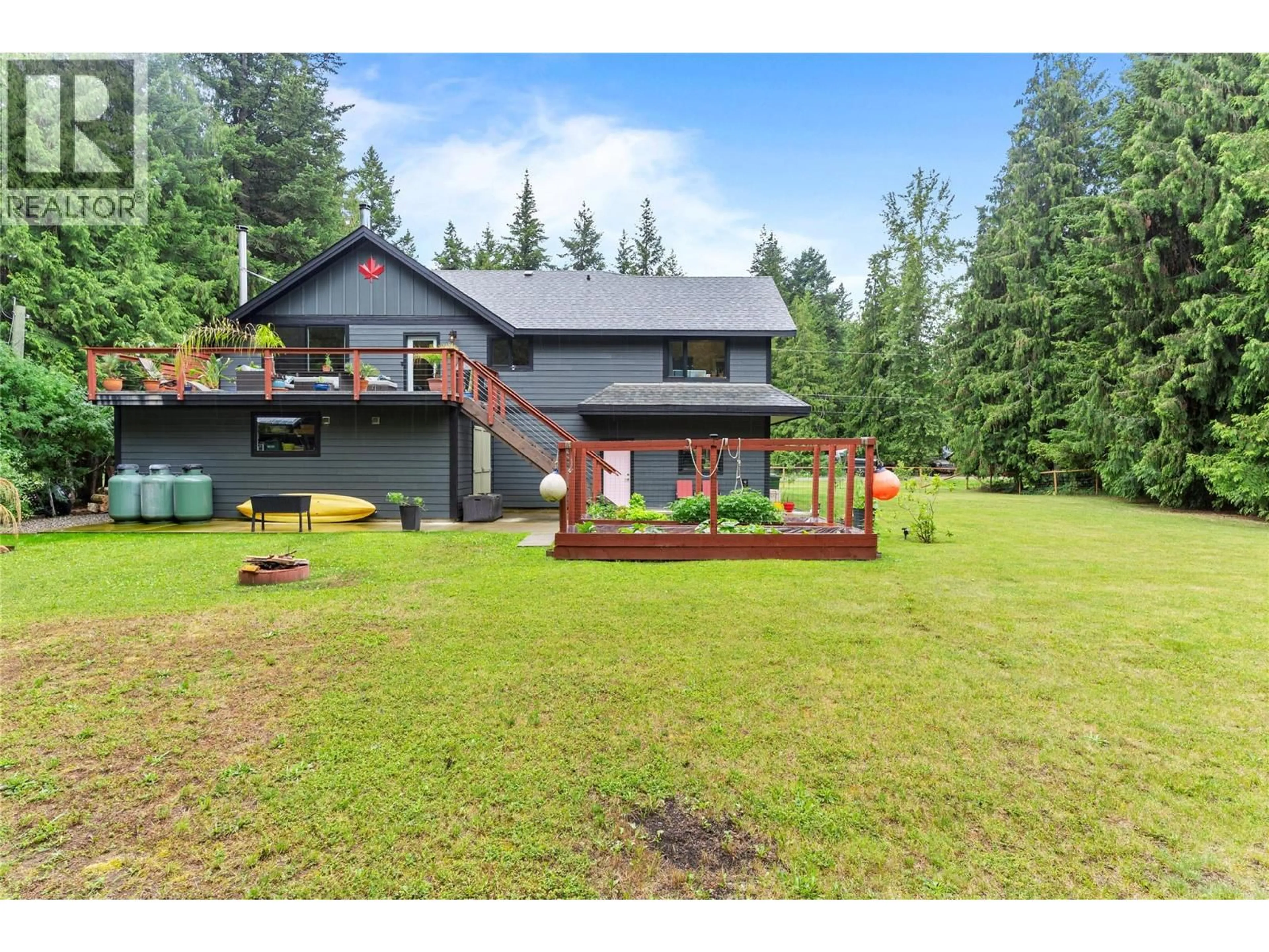 A pic from outside/outdoor area/front of a property/back of a property/a pic from drone, unknown for 4037 SANTA ROAD, Scotch Creek British Columbia V0E1M5