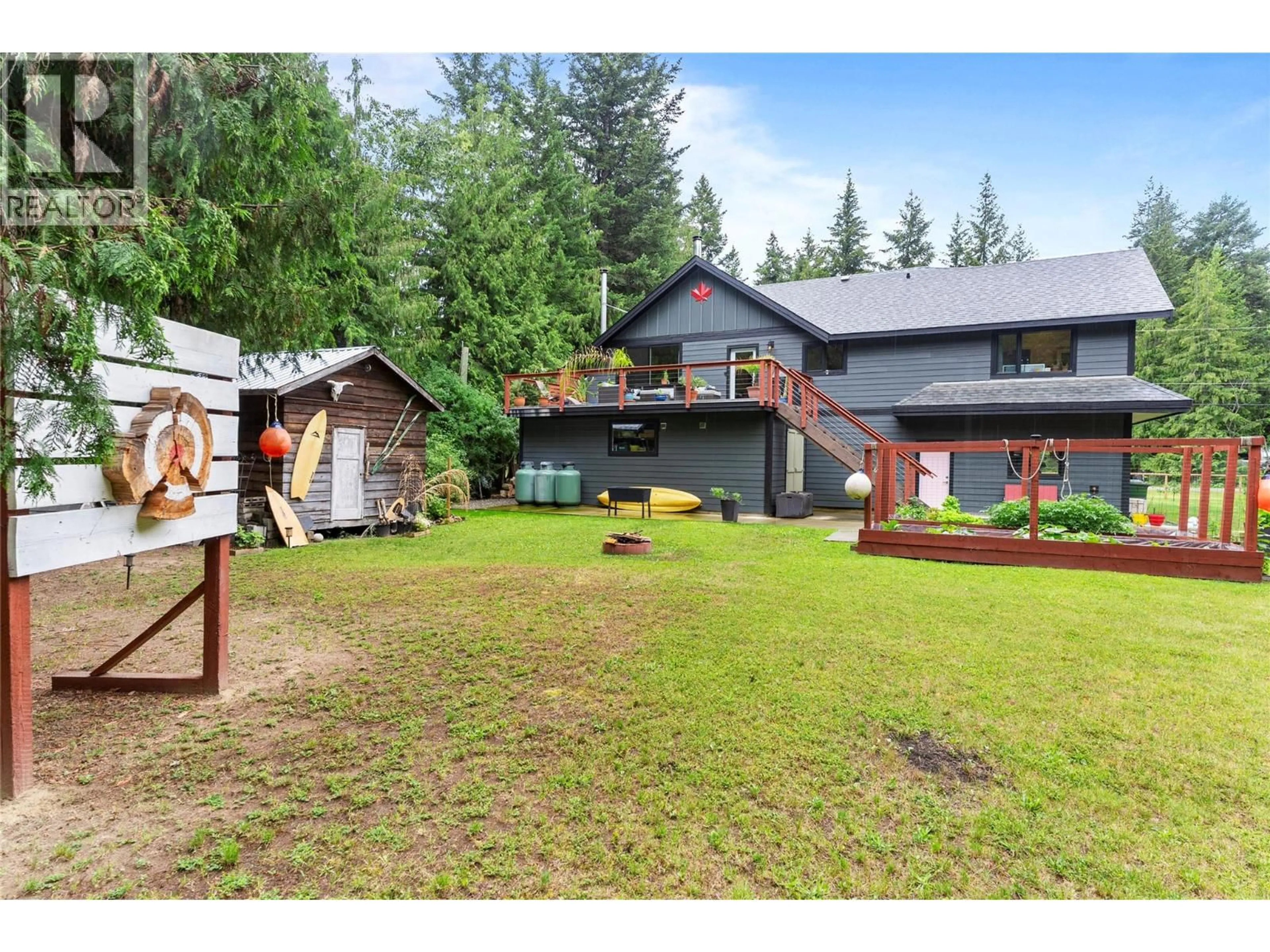 A pic from outside/outdoor area/front of a property/back of a property/a pic from drone, mountain view for 4037 SANTA ROAD, Scotch Creek British Columbia V0E1M5