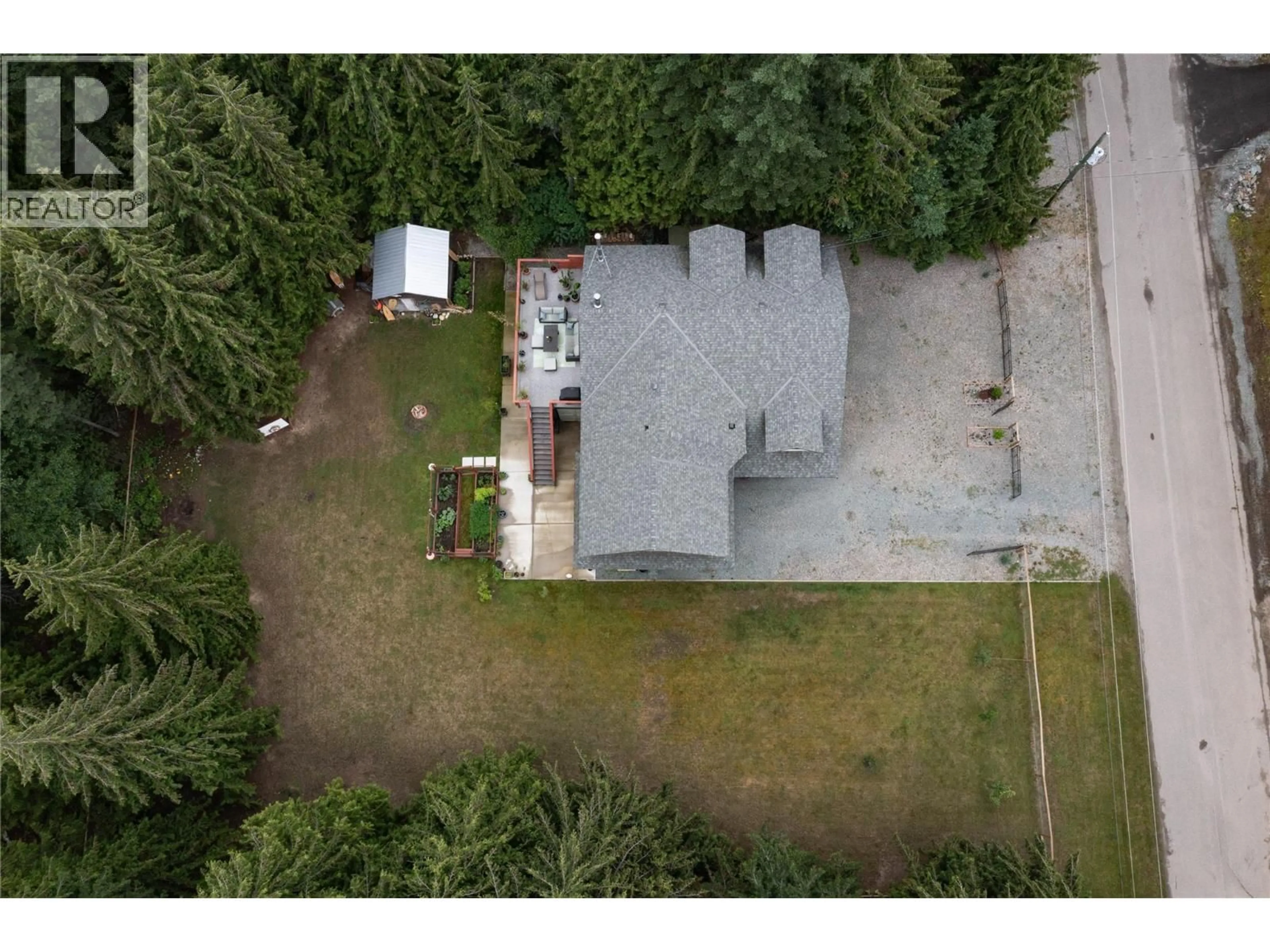 A pic from outside/outdoor area/front of a property/back of a property/a pic from drone, unknown for 4037 SANTA ROAD, Scotch Creek British Columbia V0E1M5
