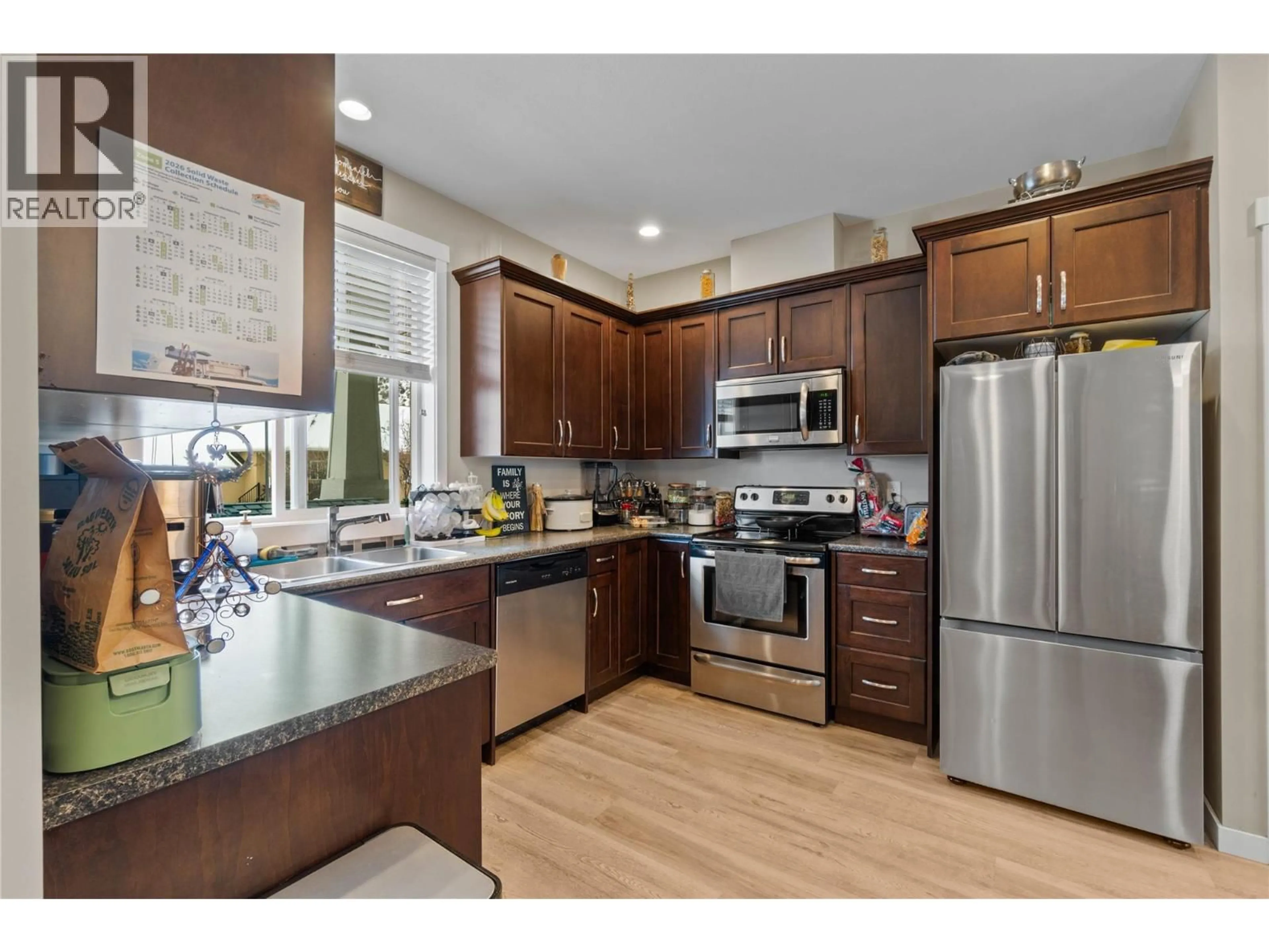 Open concept kitchen, wood/laminate floor for 56 - 2860 VALLEYVIEW DRIVE, Kamloops British Columbia V2C0B3