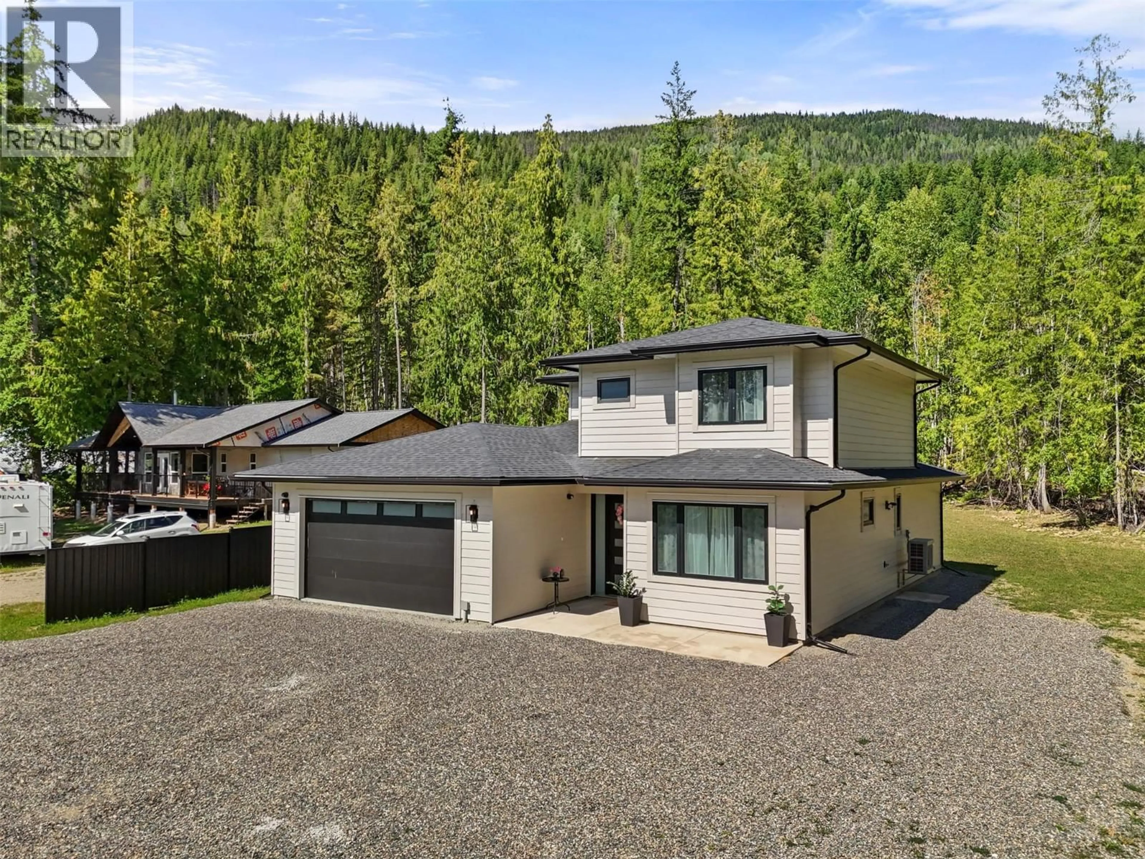 A pic from outside/outdoor area/front of a property/back of a property/a pic from drone, mountain view for 7670 MOUNTAIN DRIVE, Anglemont British Columbia V0E1M8