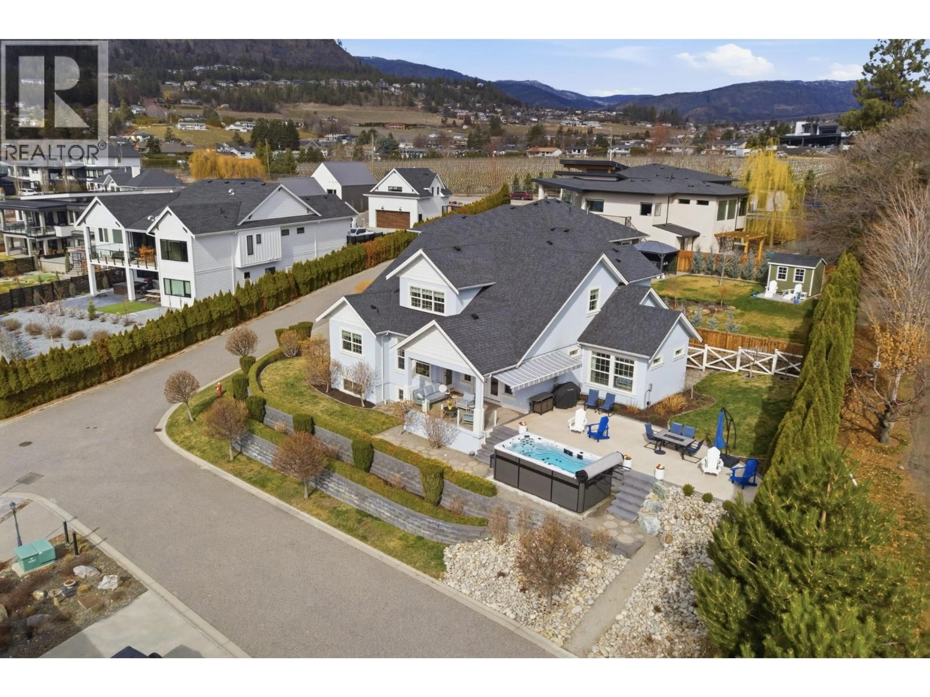 A pic from outside/outdoor area/front of a property/back of a property/a pic from drone, mountain view for 4 - 3121 THACKER DRIVE, West Kelowna British Columbia V1Z1X6