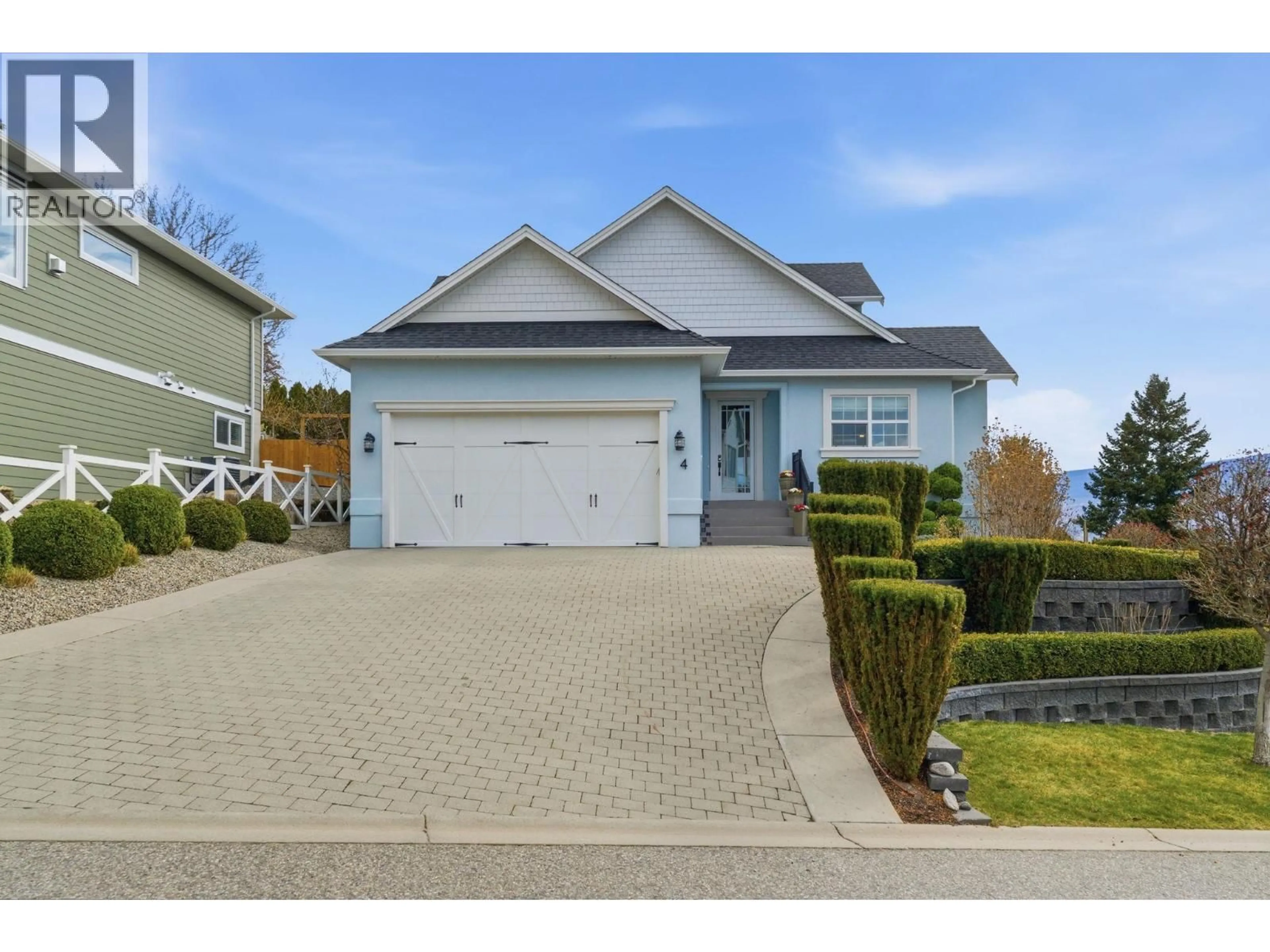 Home with vinyl exterior material, street for 4 - 3121 THACKER DRIVE, West Kelowna British Columbia V1Z1X6