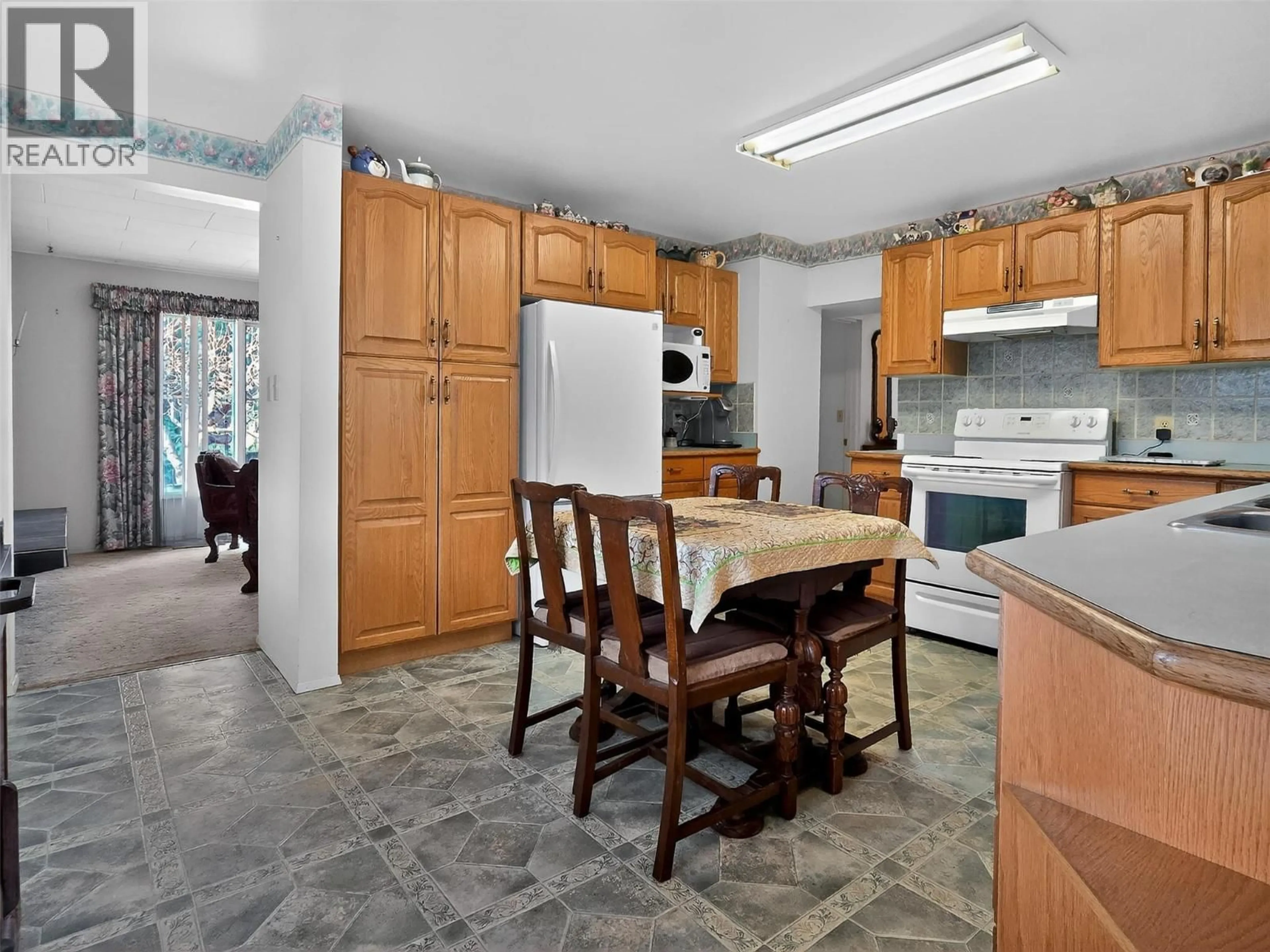 Open concept kitchen, ceramic/tile floor for 124 97C HIGHWAY, Ashcroft British Columbia V0K1A0