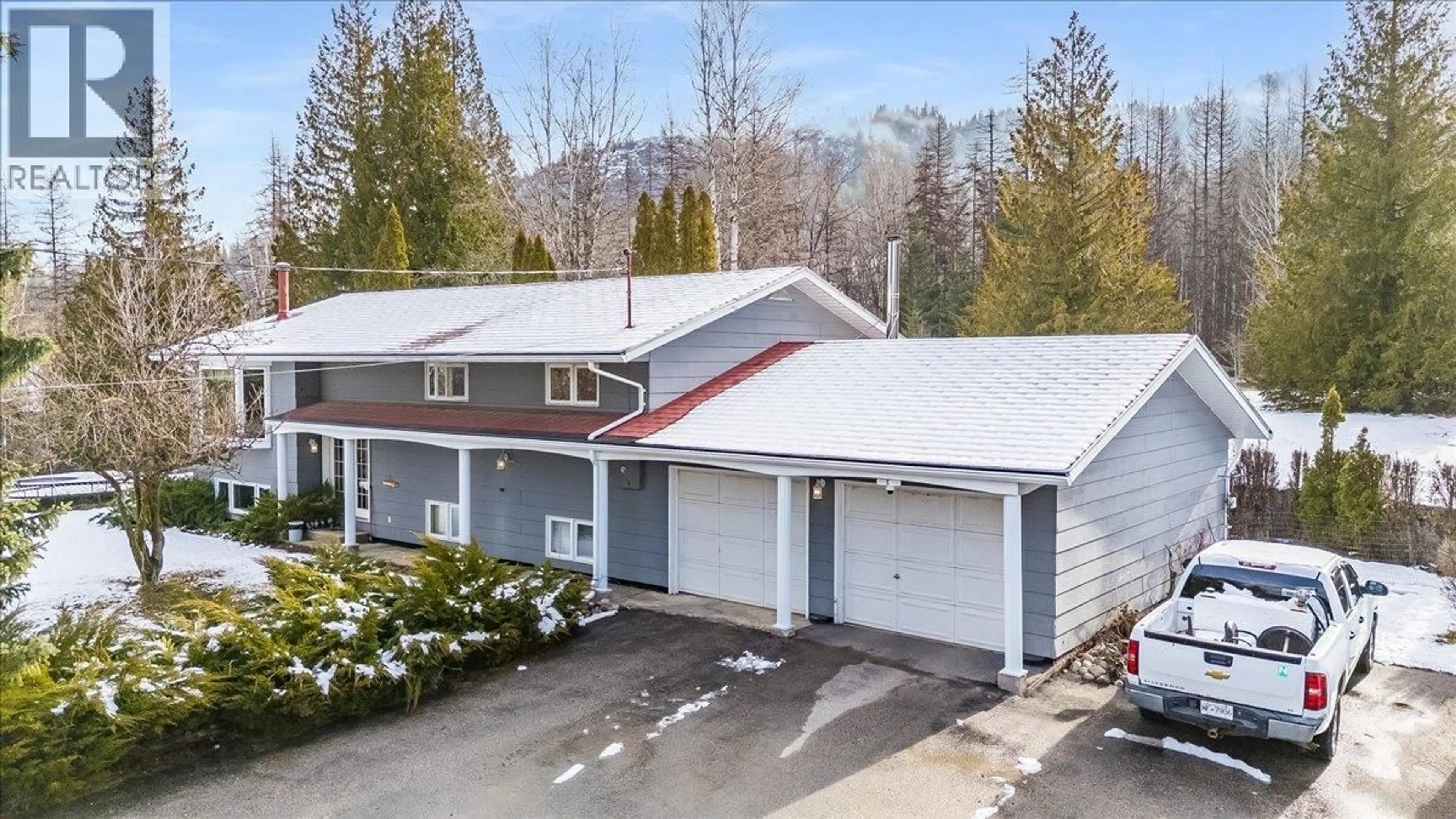 A pic from outside/outdoor area/front of a property/back of a property/a pic from drone, unknown for 1076 COLUMBIA GARDENS ROAD, Fruitvale British Columbia V0G1L1