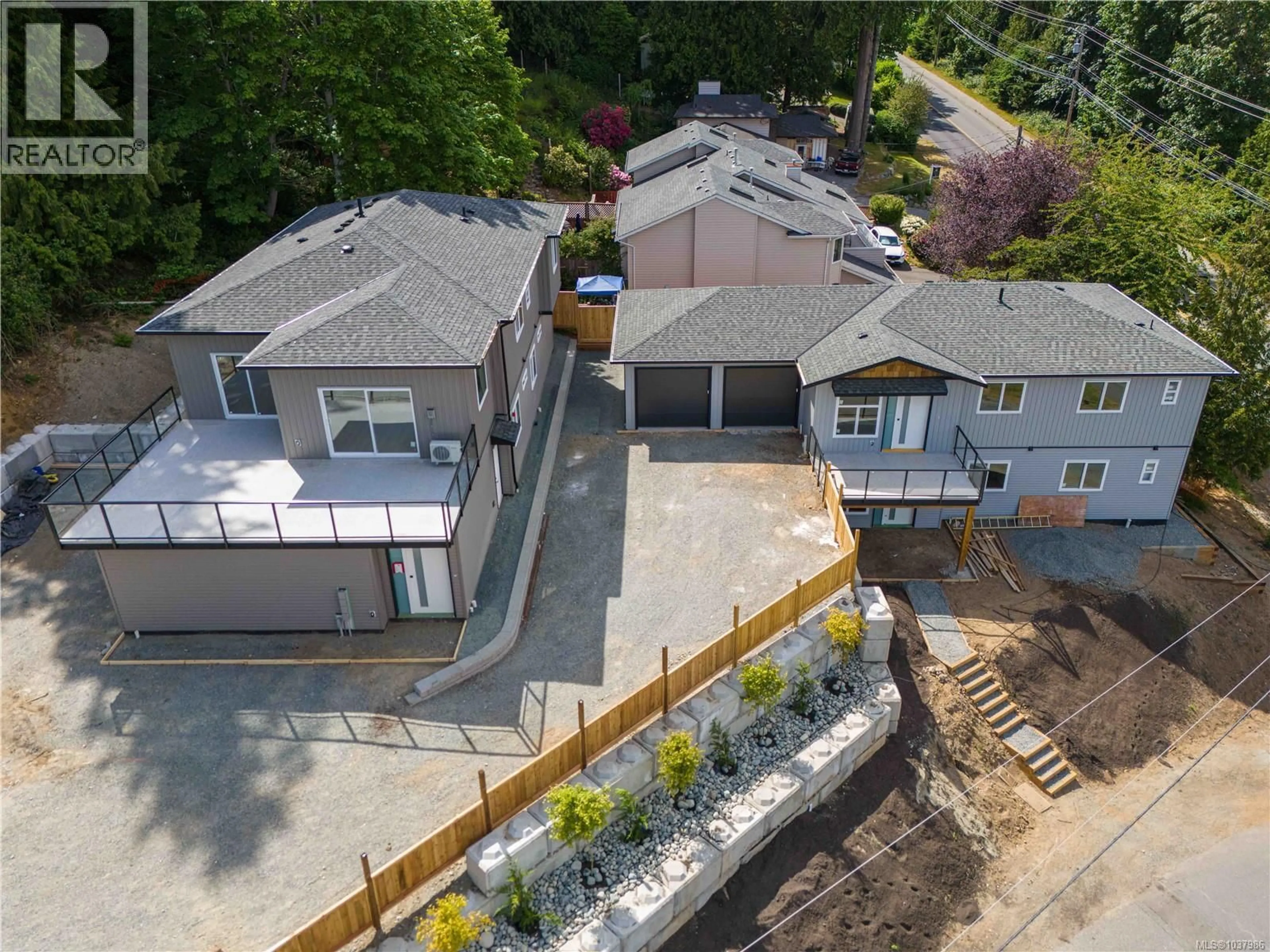 A pic from outside/outdoor area/front of a property/back of a property/a pic from drone, street for 101 - 5309 TOMS TURNABOUT, Nanaimo British Columbia V9T5M9