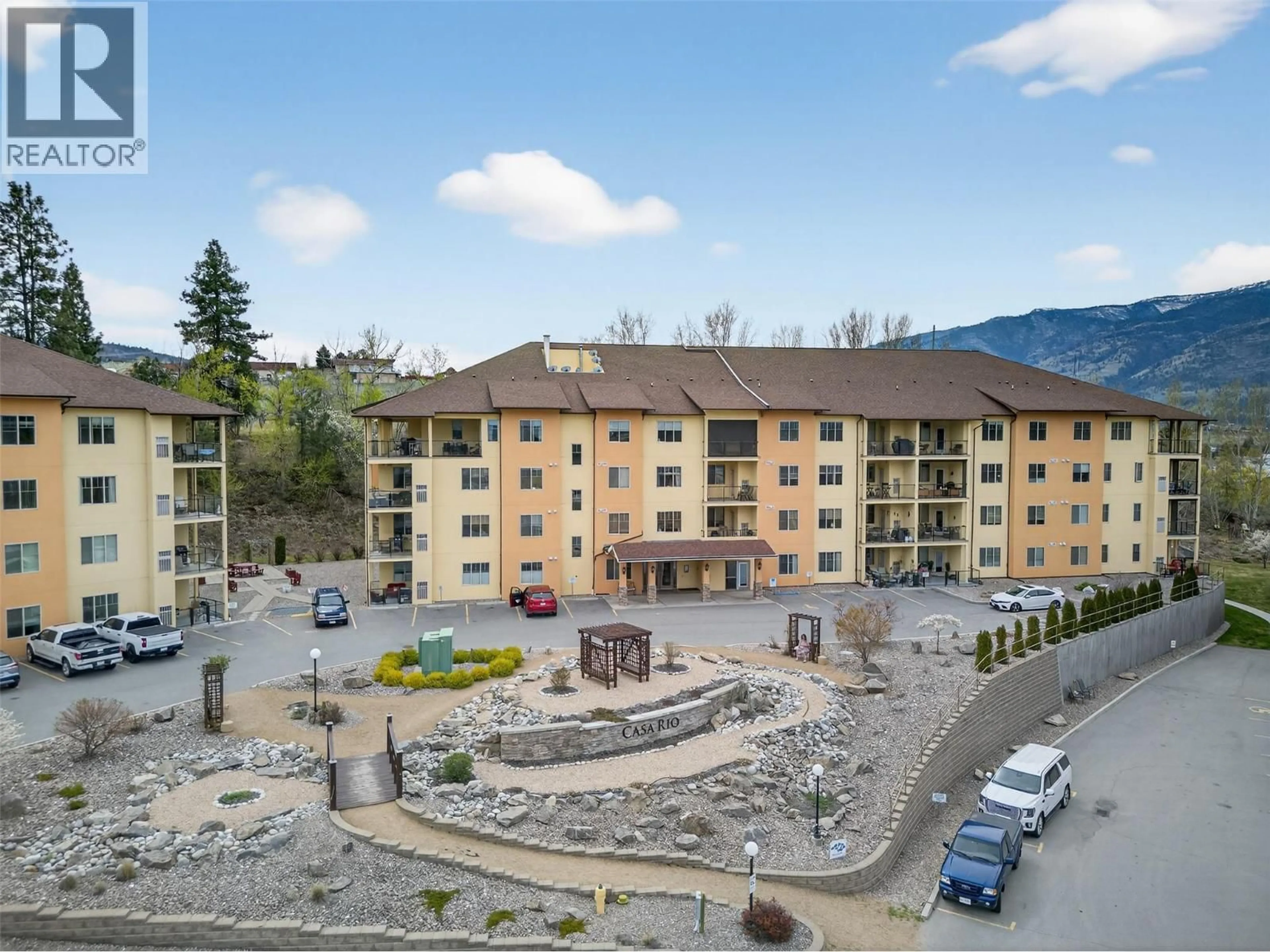 A pic from outside/outdoor area/front of a property/back of a property/a pic from drone, mountain view for 109B - 921 SPILLWAY STREET, Oliver British Columbia V0H1T0