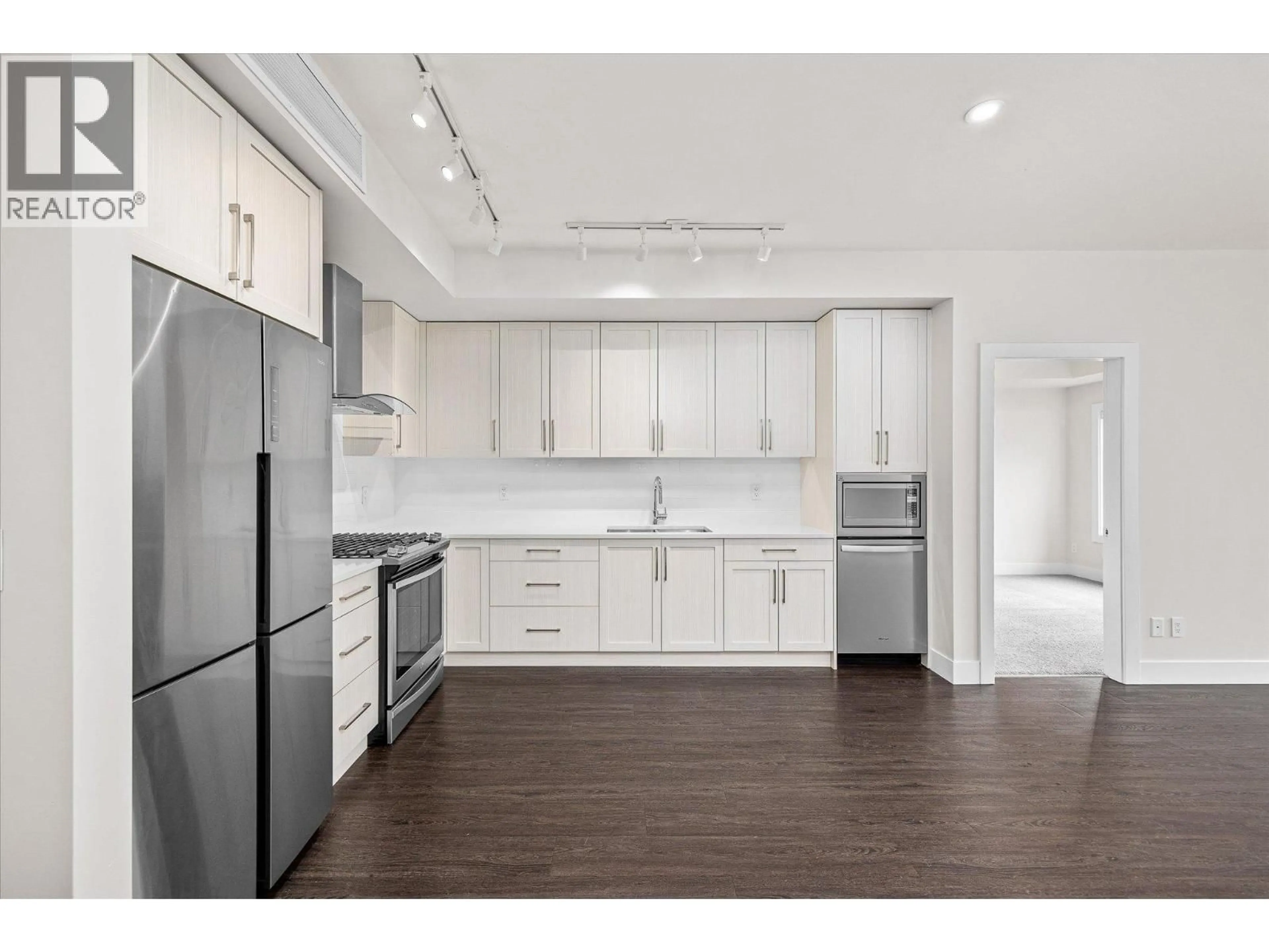 Open concept kitchen, unknown for 105 - 4380 LAKESHORE ROAD, Kelowna British Columbia V1W5N3