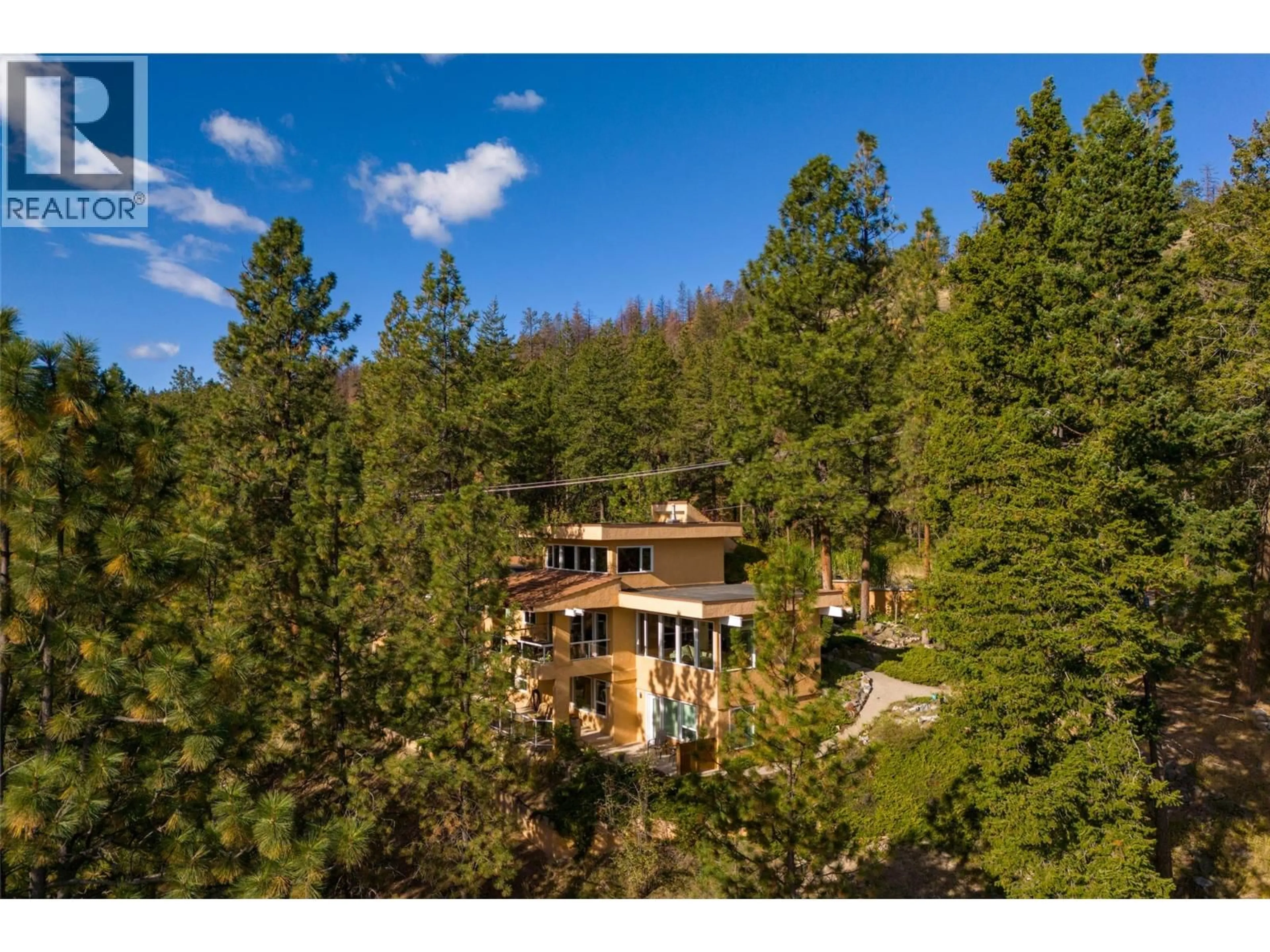 A pic from outside/outdoor area/front of a property/back of a property/a pic from drone, forest/trees view for 1642 WEST KELOWNA ROAD, West Kelowna British Columbia V1Z3B7