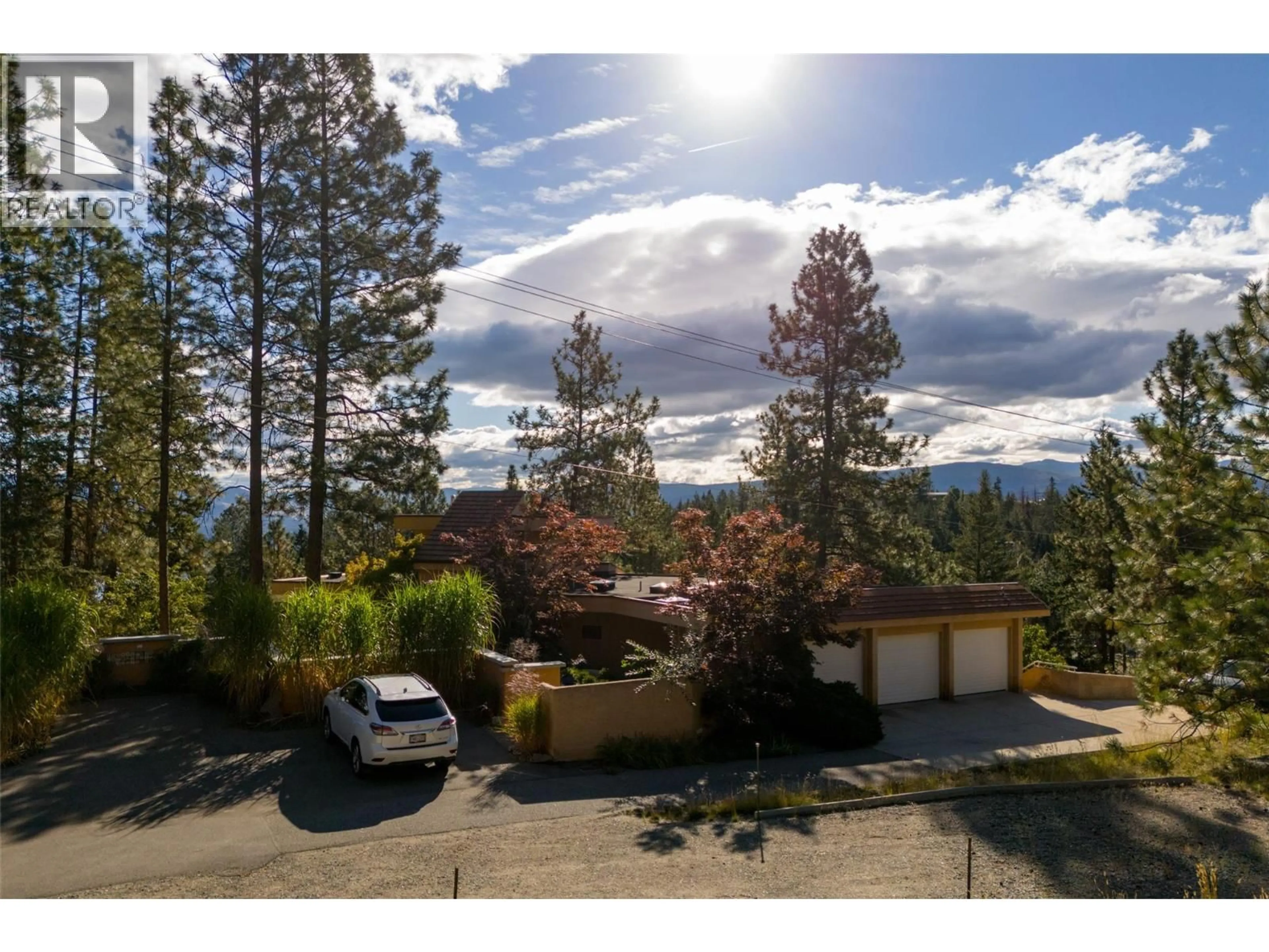 A pic from outside/outdoor area/front of a property/back of a property/a pic from drone, mountain view for 1642 WEST KELOWNA ROAD, West Kelowna British Columbia V1Z3B7