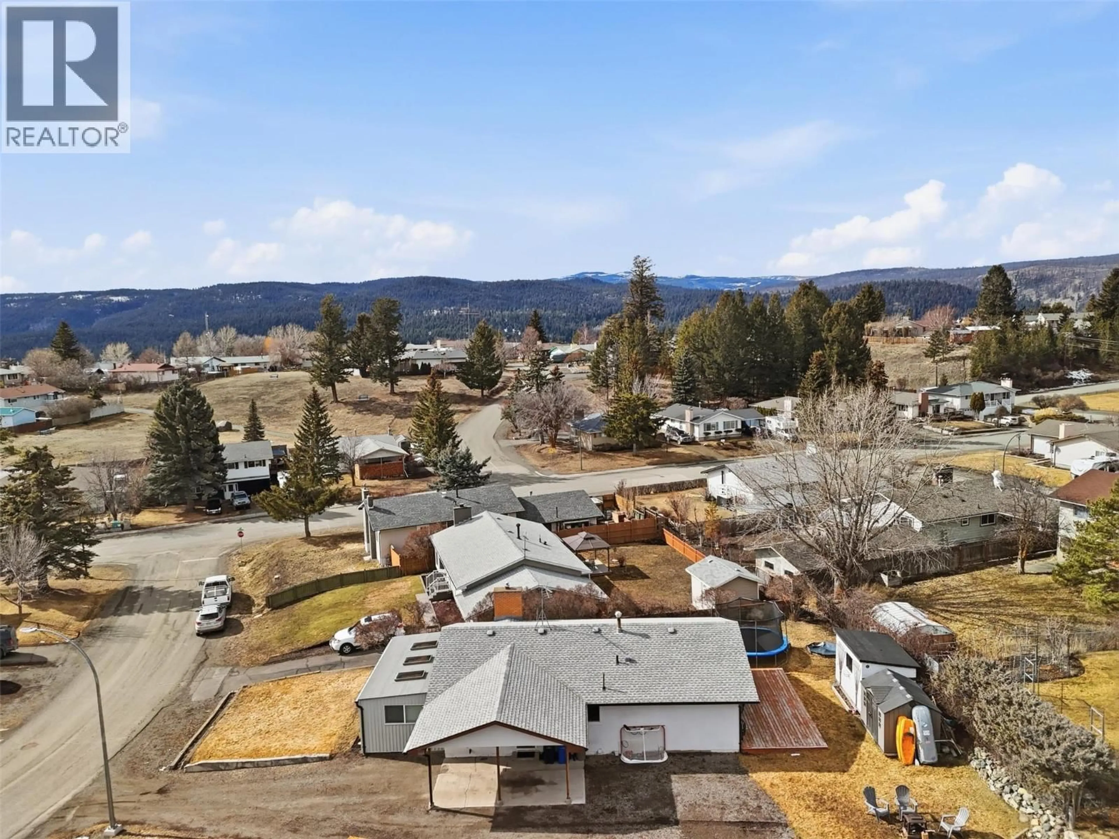A pic from outside/outdoor area/front of a property/back of a property/a pic from drone, mountain view for 49 BERYL DRIVE, Logan Lake British Columbia V0K1W0