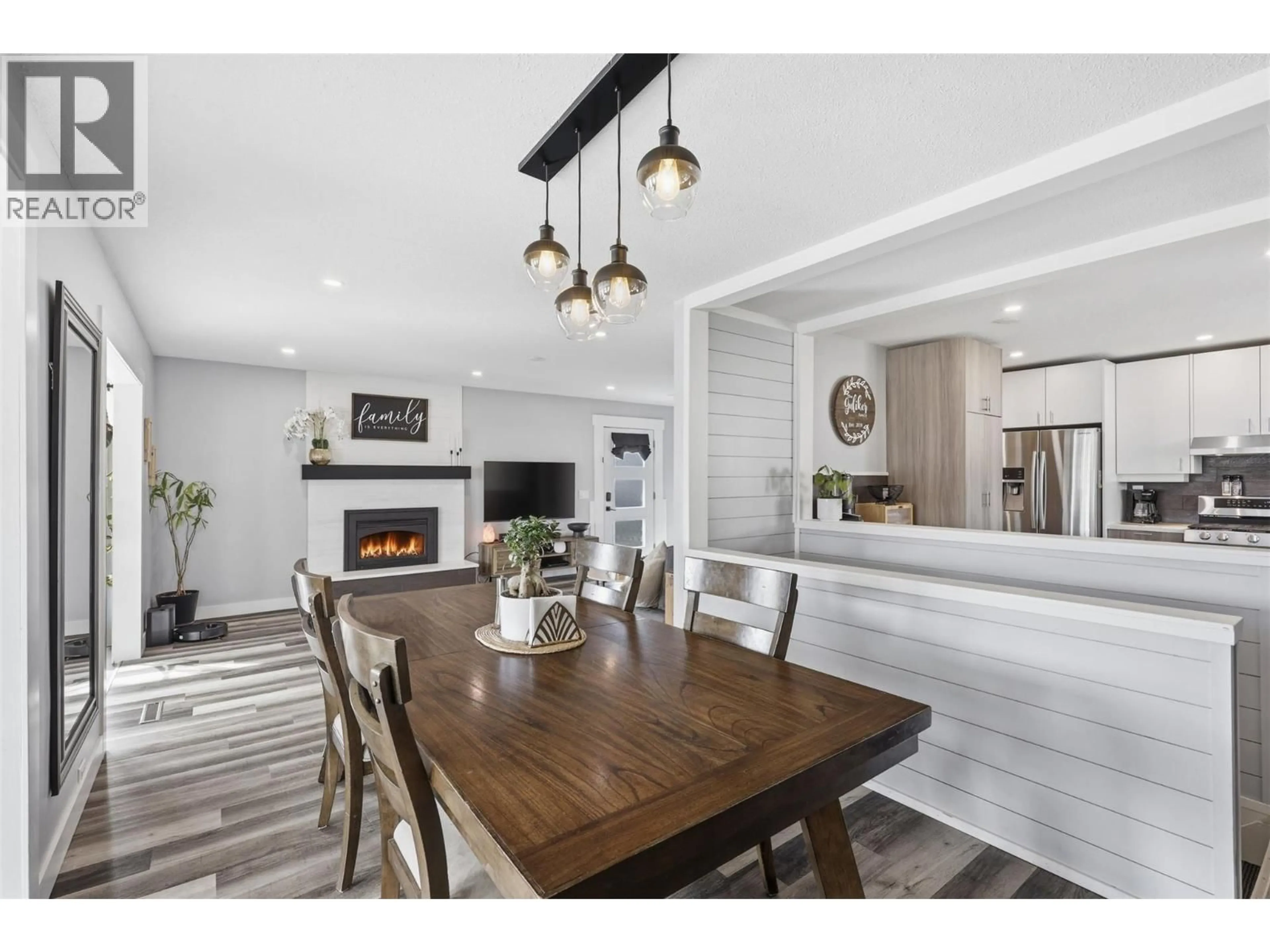 Open concept kitchen, wood/laminate floor for 49 BERYL DRIVE, Logan Lake British Columbia V0K1W0