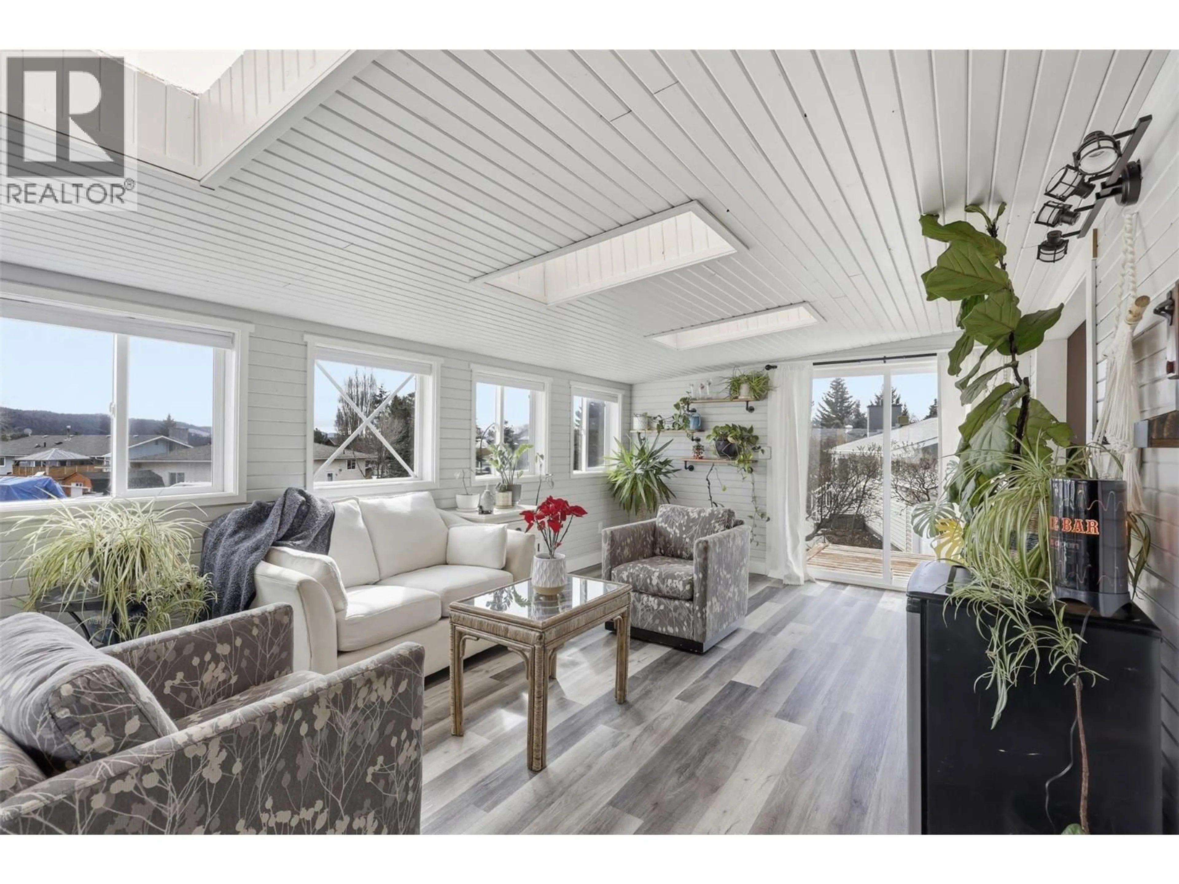Living room with furniture, wood/laminate floor for 49 BERYL DRIVE, Logan Lake British Columbia V0K1W0