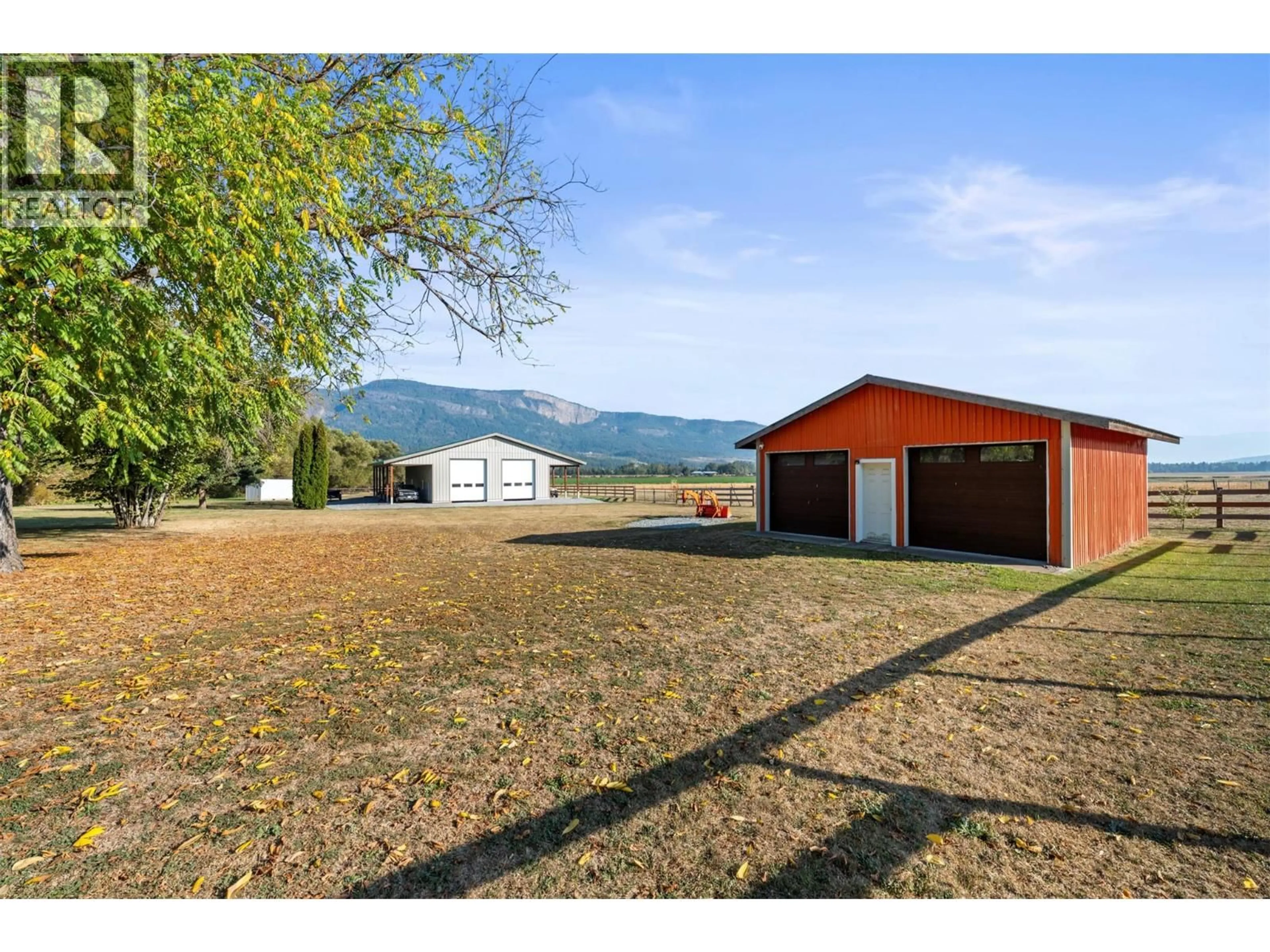 A pic from outside/outdoor area/front of a property/back of a property/a pic from drone, mountain view for 6619 97A HIGHWAY NORTH, Enderby British Columbia V0E1V3