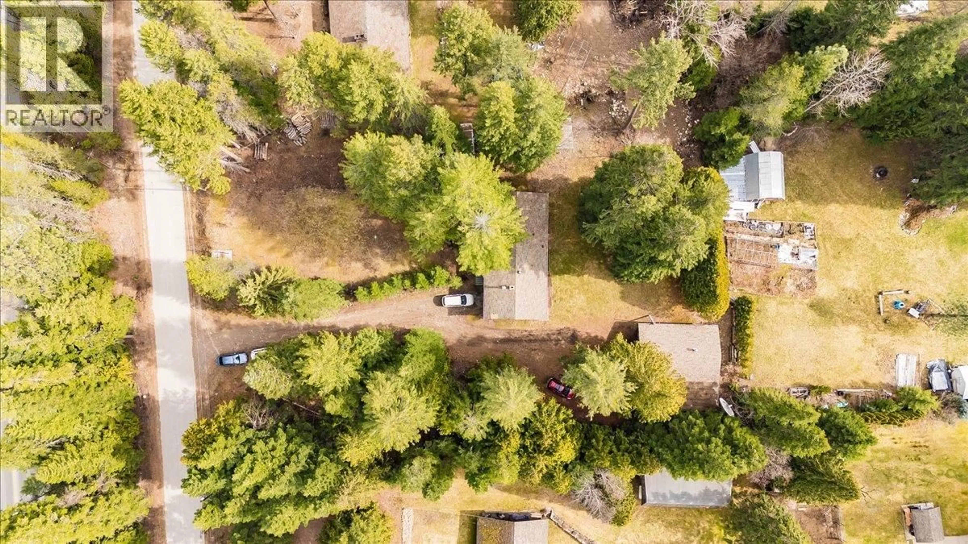 A pic from outside/outdoor area/front of a property/back of a property/a pic from drone, forest/trees view for 1055 WHITE ROAD, South Slocan British Columbia V0G2G0