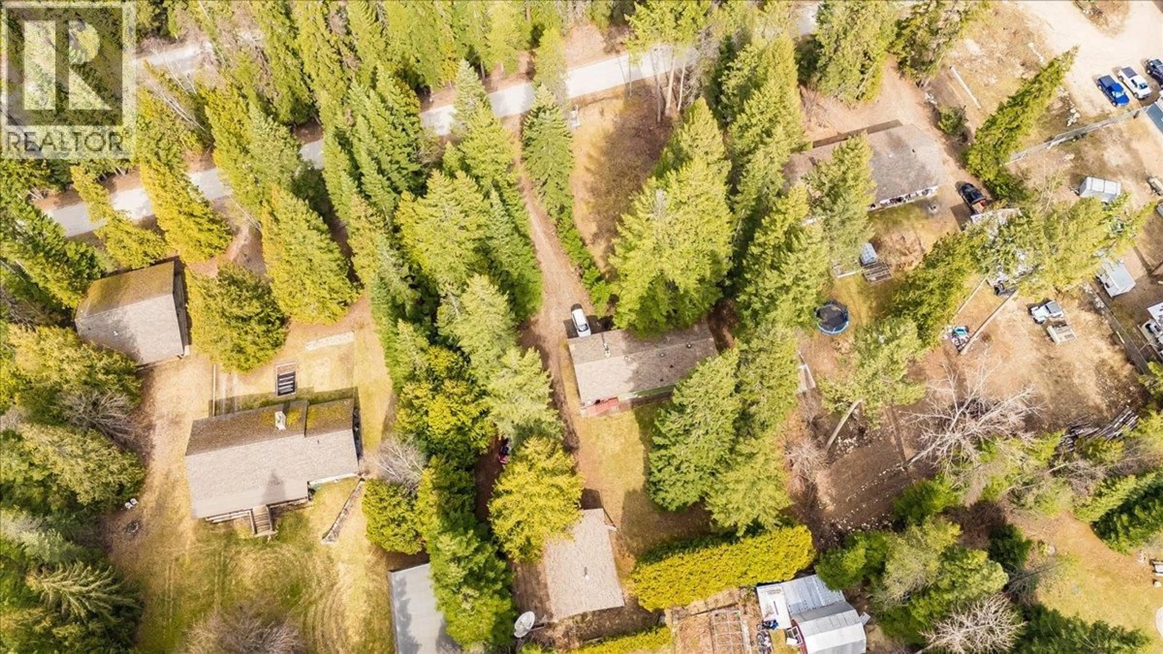 A pic from outside/outdoor area/front of a property/back of a property/a pic from drone, forest/trees view for 1055 WHITE ROAD, South Slocan British Columbia V0G2G0