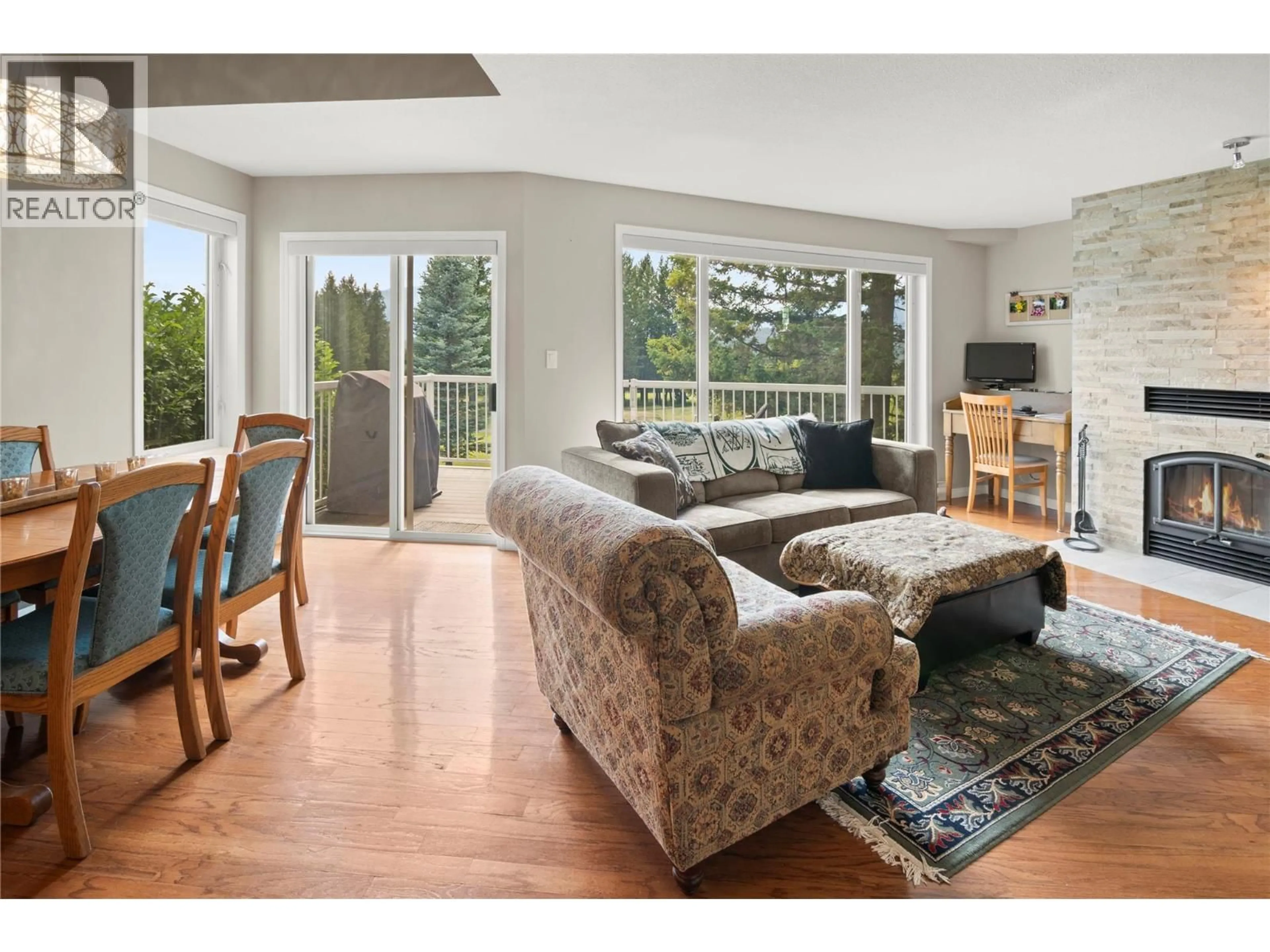 Living room with furniture, wood/laminate floor for 17 - 7525 COLUMBIA AVENUE, Radium Hot Springs British Columbia V0A1M0