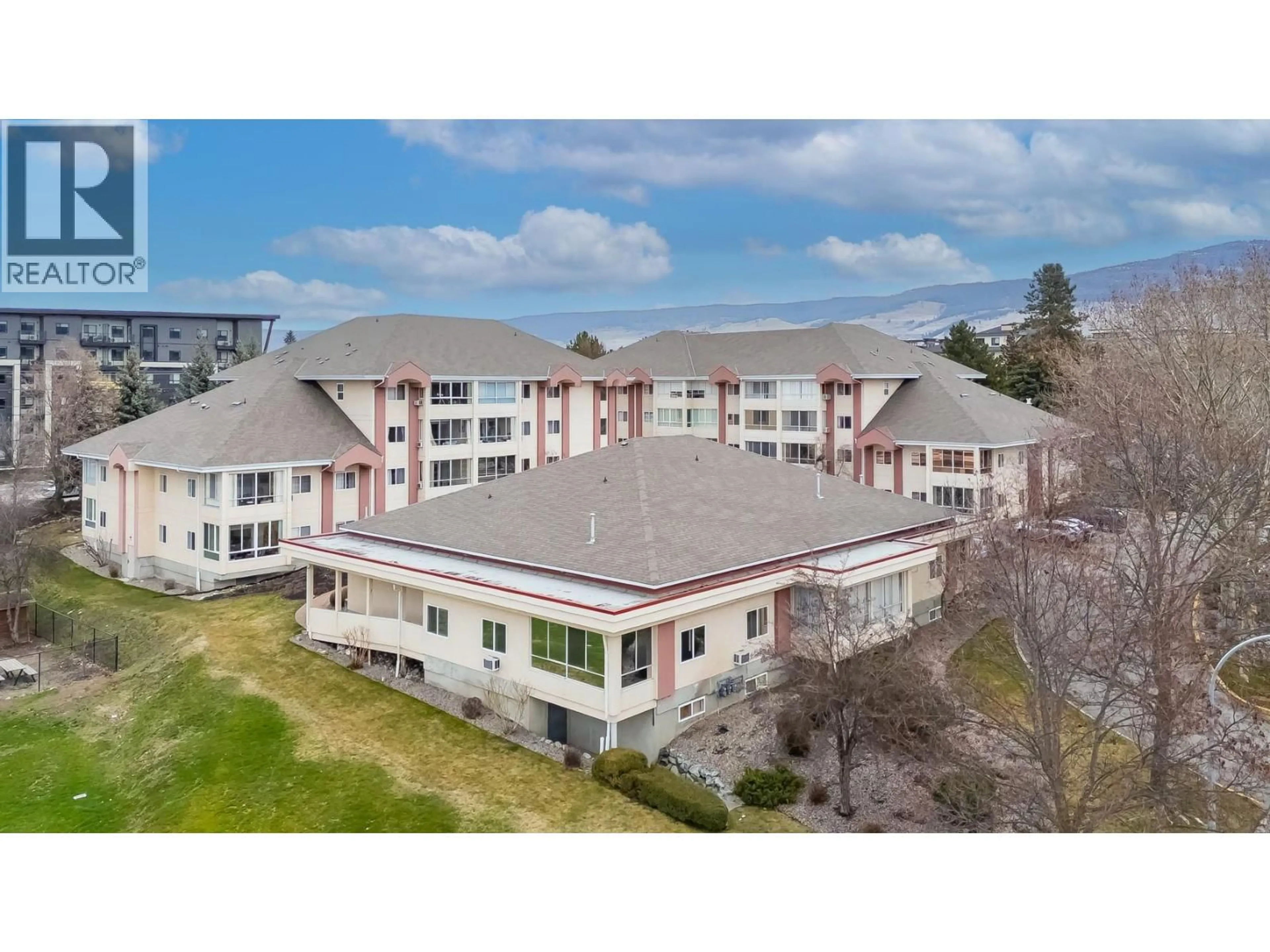 A pic from outside/outdoor area/front of a property/back of a property/a pic from drone, unknown for 215 - 920 SASKATOON ROAD, Kelowna British Columbia V1X7P8